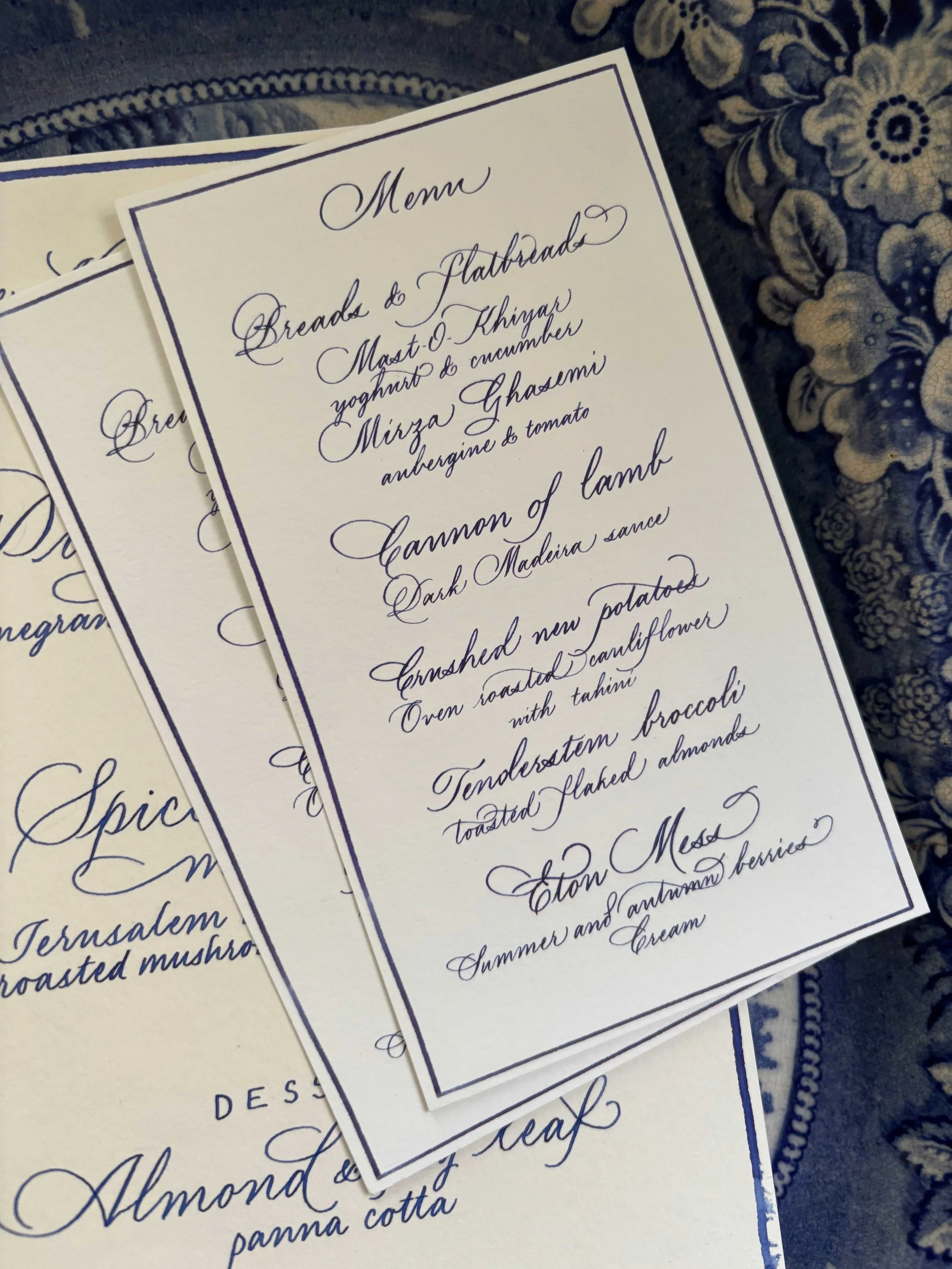 Elegant wedding menu calligraphy by London studio