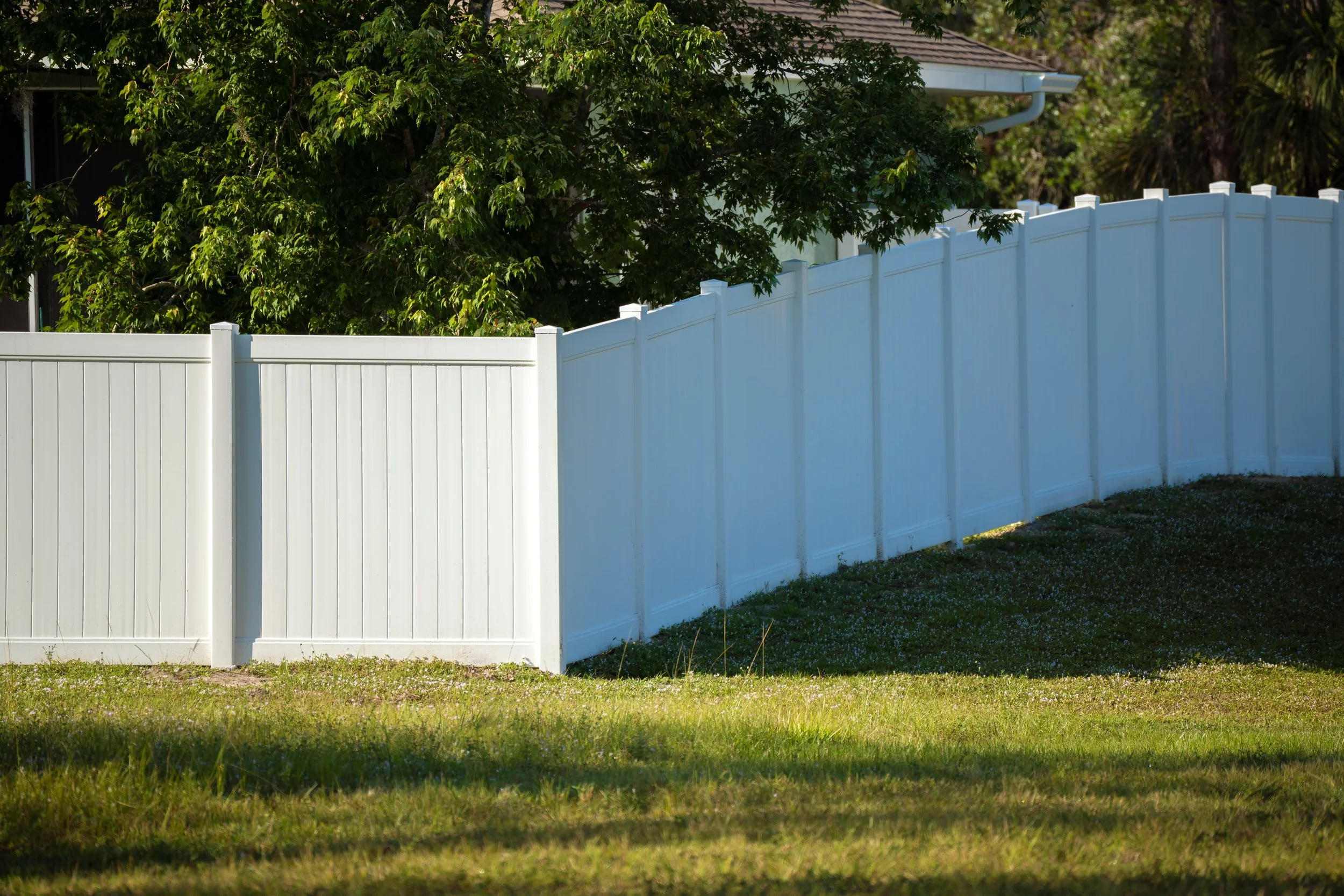 White vinyl privacy fence installation — Mount Pleasant, SC · Budget Fencing & Construction