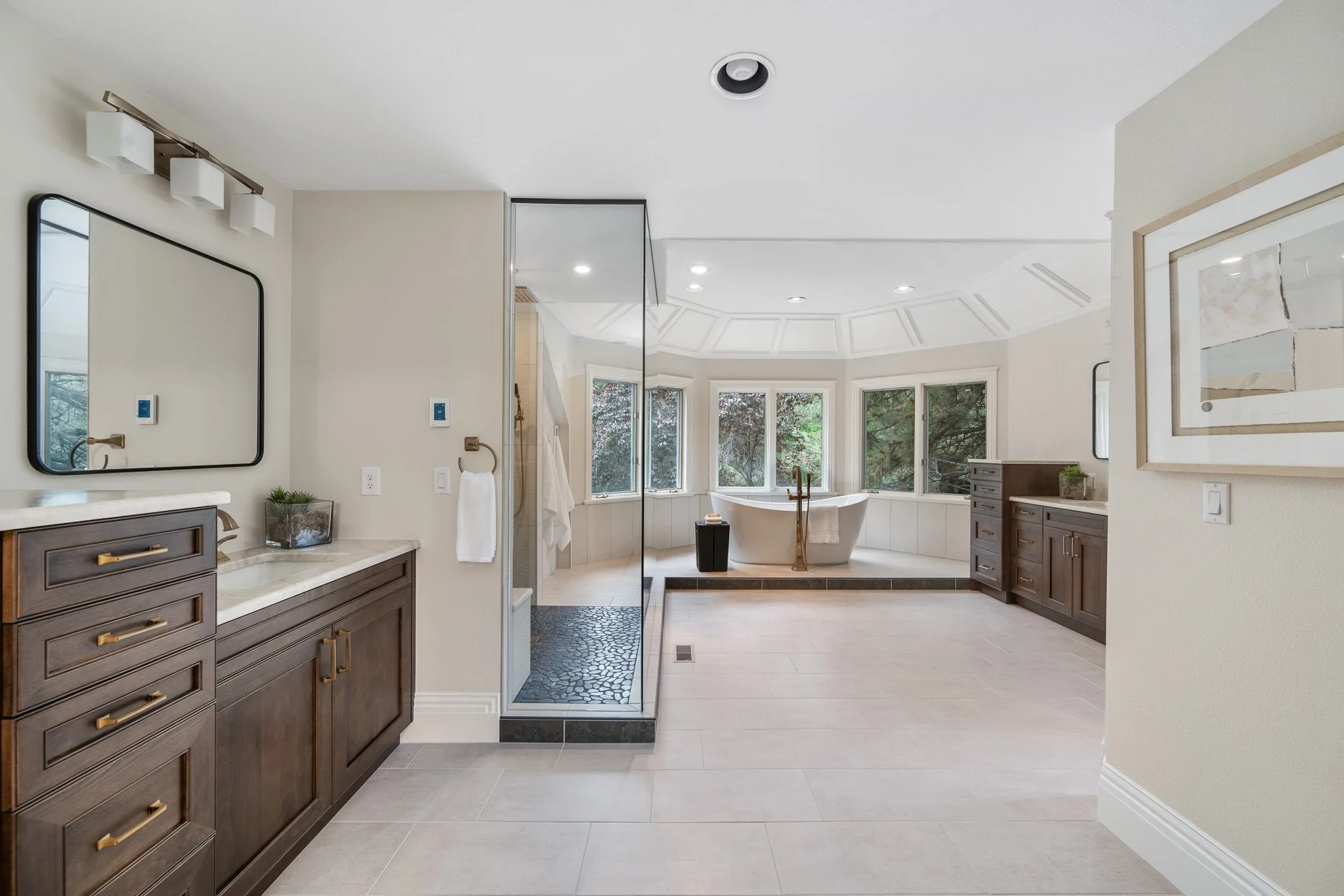 Exceptional primary bath with standalone tub, light and bright