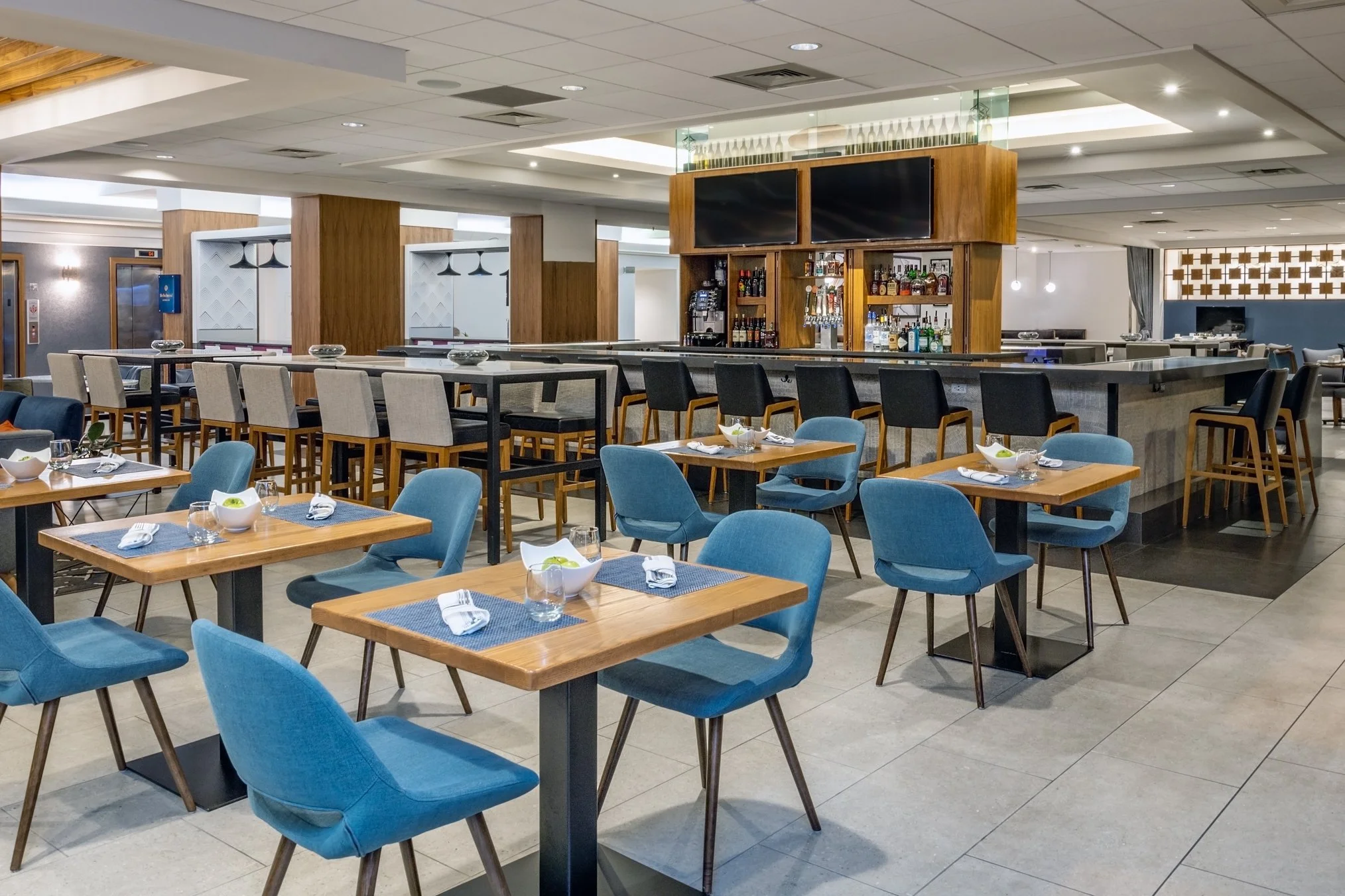 Hotel dining area with blue chairs
