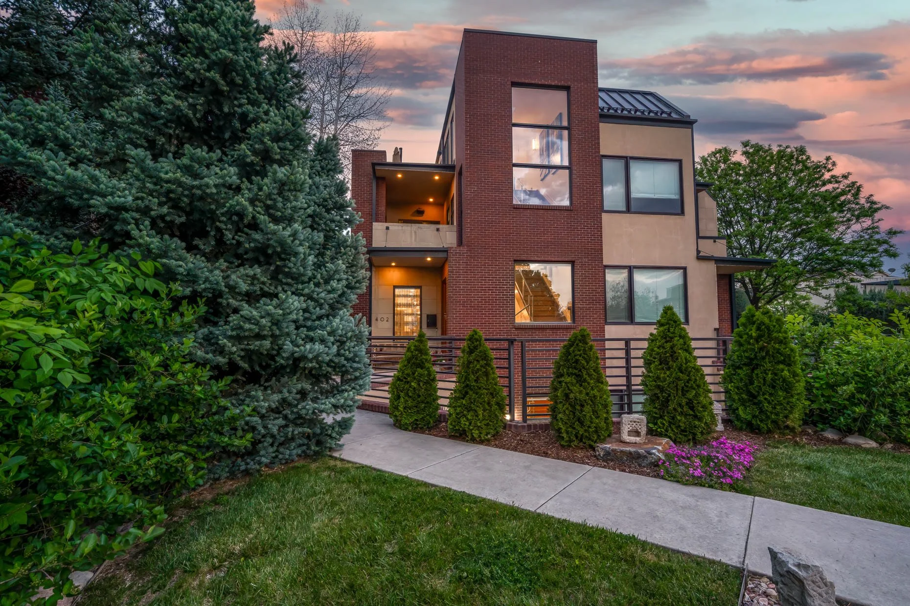 Dusk exterior of modern townhome in Cherry Creek North