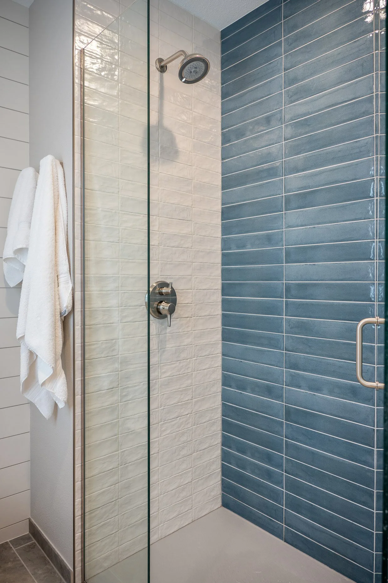 Lovely shower with amazing blue and white tile