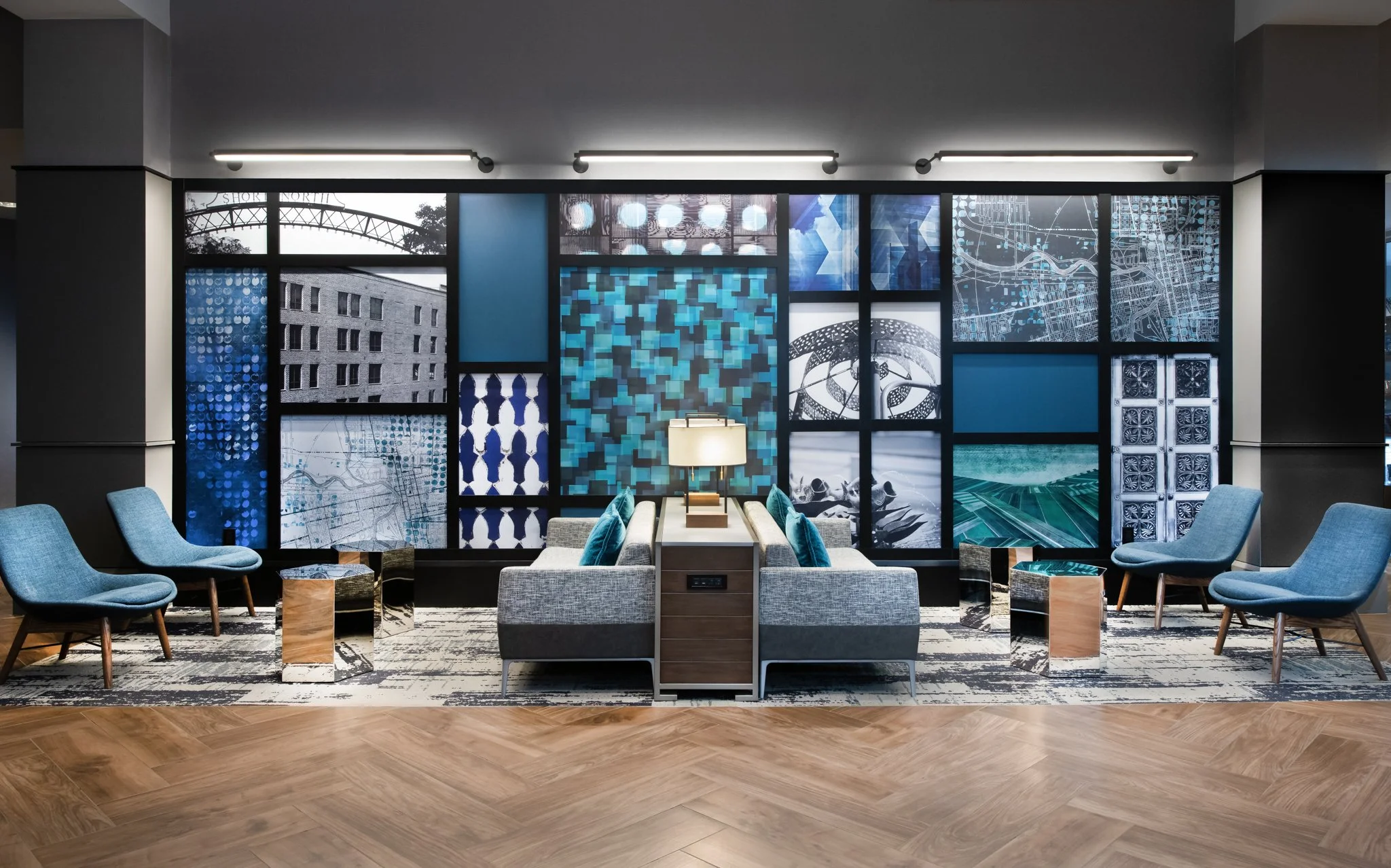 Hotel lobby with seating area and unusual wall art