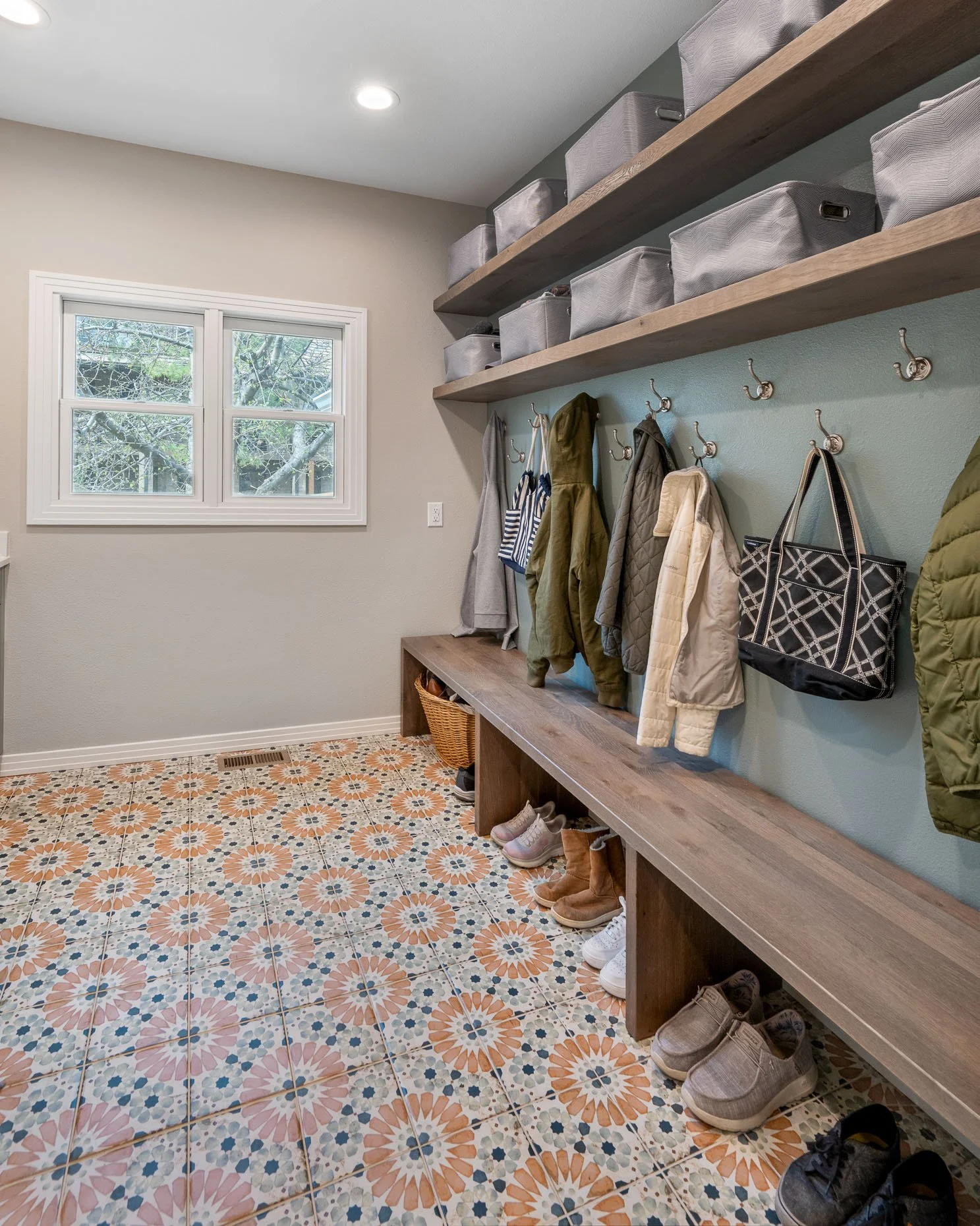 Fun mudroom with great floor tiles