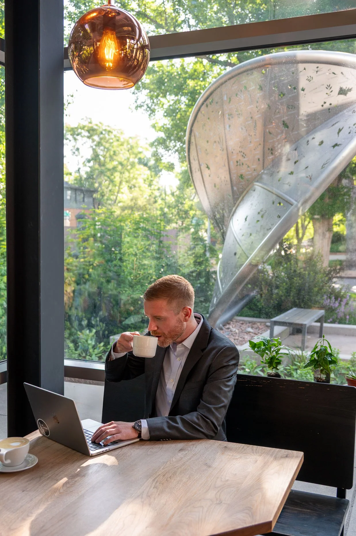 Man drinking coffee in coffe shop