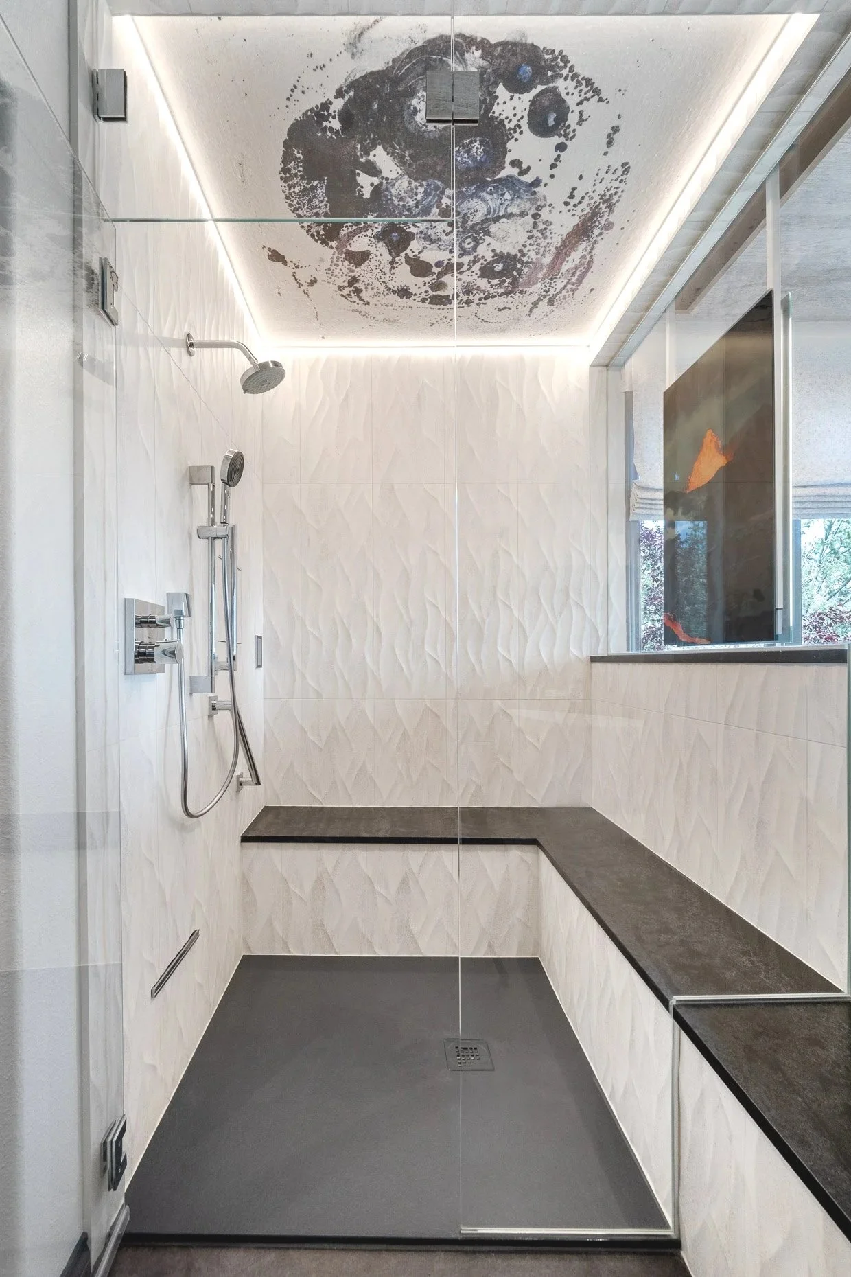 Award winning shower with glacier design ceiling and wavy tile design