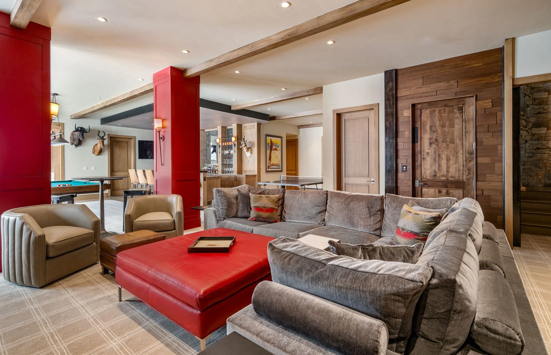 Mountain home family room with fire engine read accents