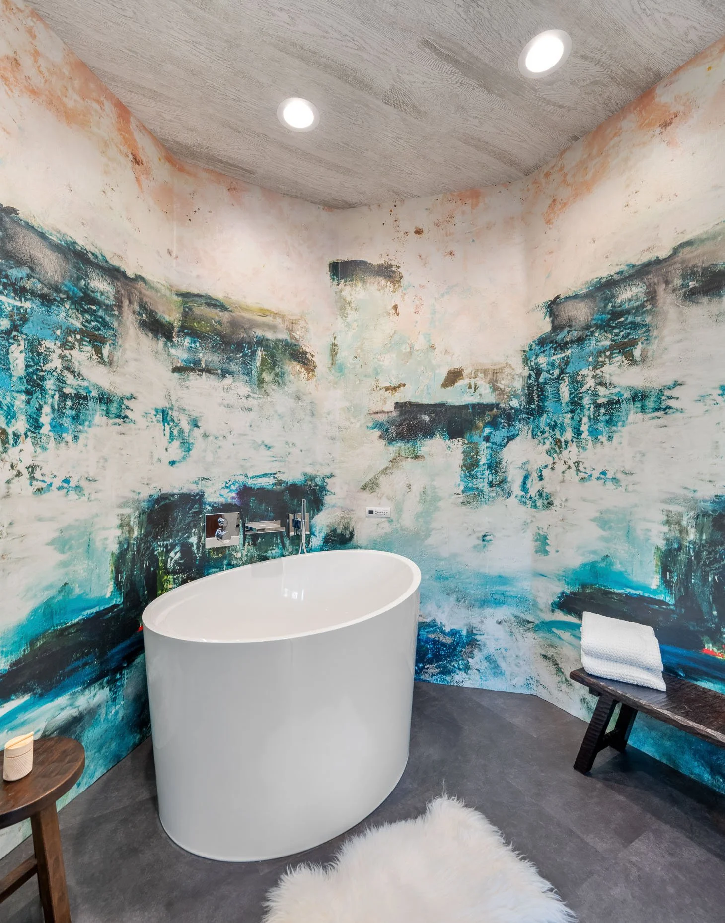 Award winning bath design with stand alone tub, curved walls and glacier design