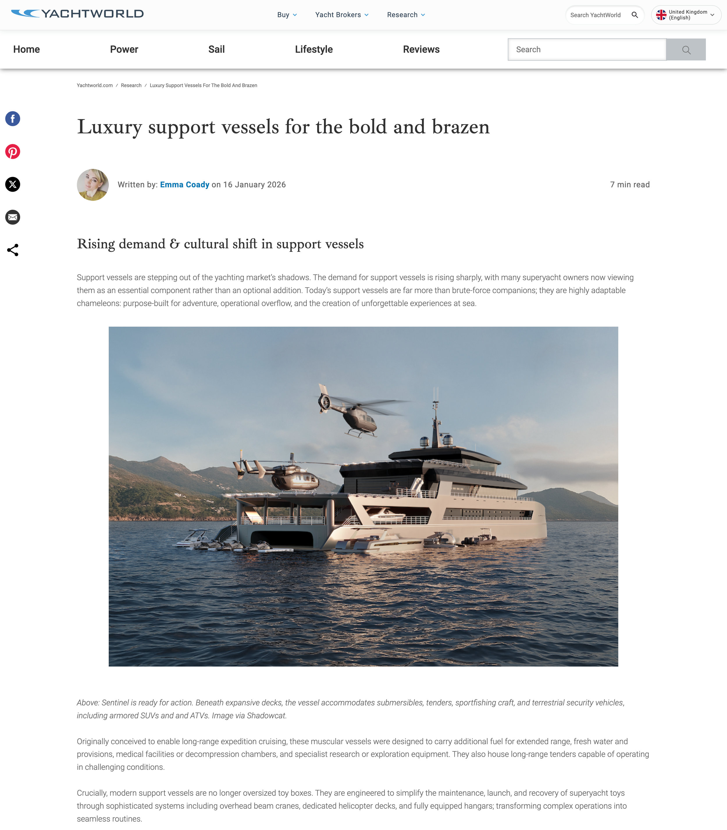 A luxury support vessel with helicopters and tenders on water, with mountains in the background.