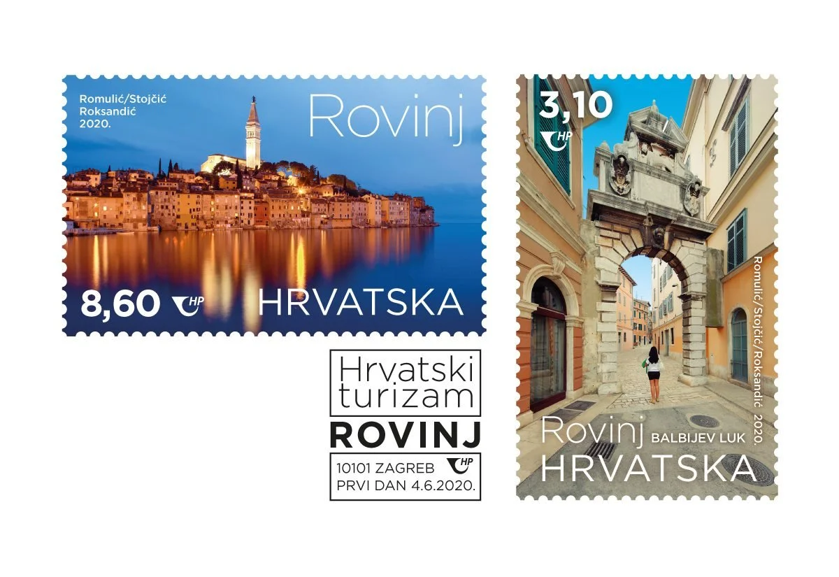 Two Croatian postage stamps. The first stamp features a nighttime cityscape of Rovinj with illuminated buildings and a tall tower, with a denomination of 8.60 HRK. The second stamp depicts a street view in Rovinj with a pedestrian walking through an 