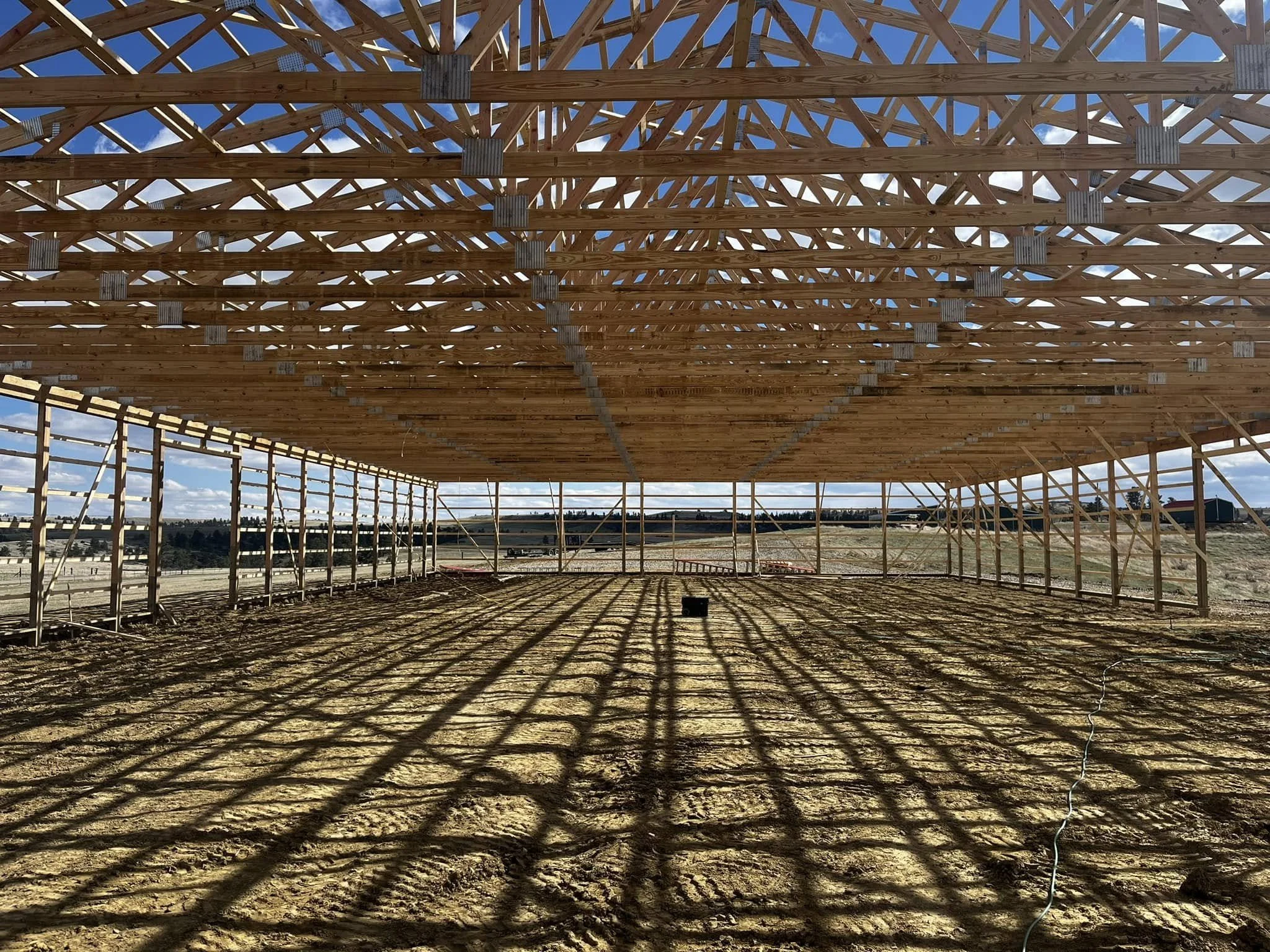 Wooden framing structure of a building under construction 