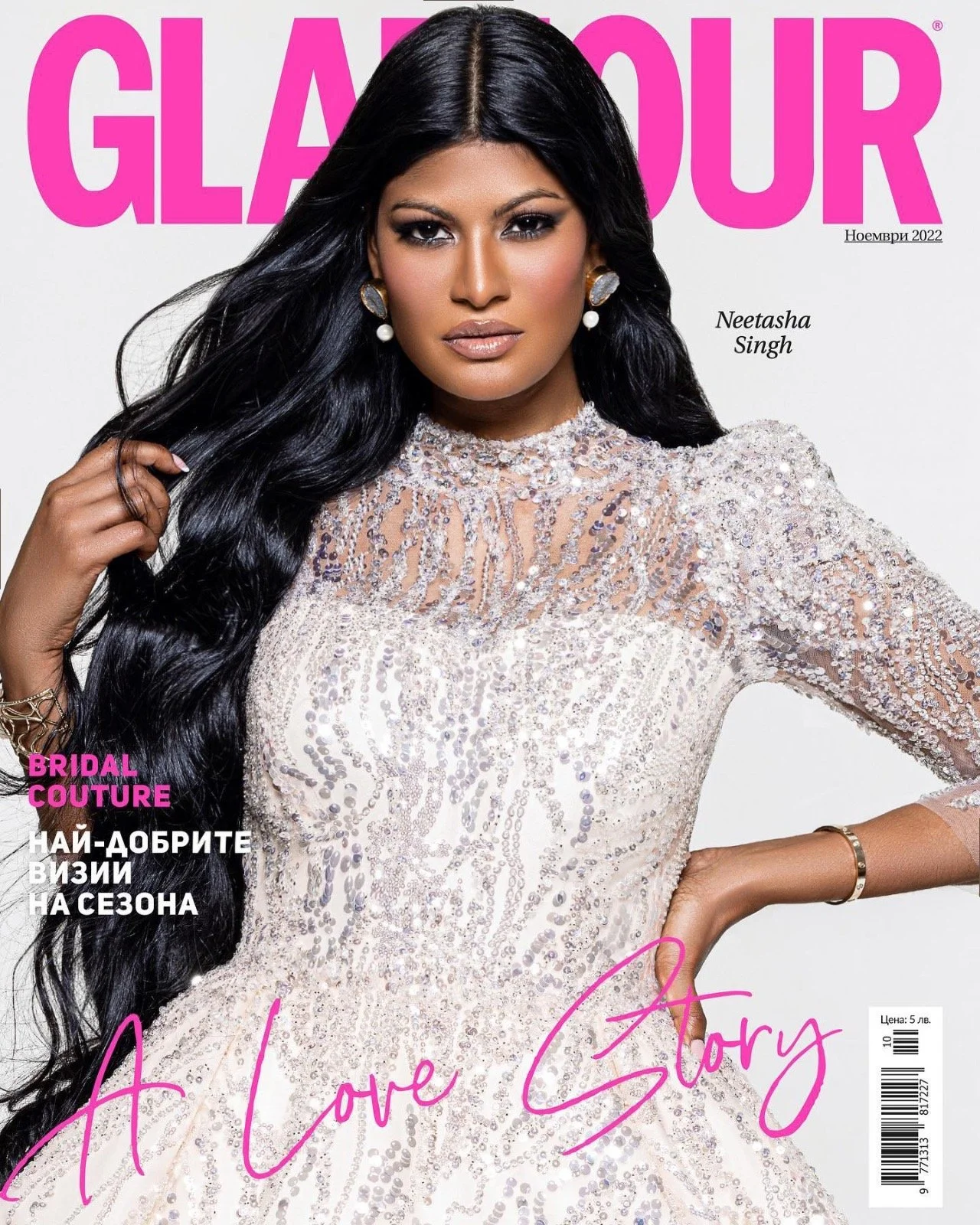 Glamour magazine cover featuring Neetasha Singh in a white, sequined bridal gown with long black hair, jewelry, and bold makeup, with pink and black text references to bridal couture and love story.
