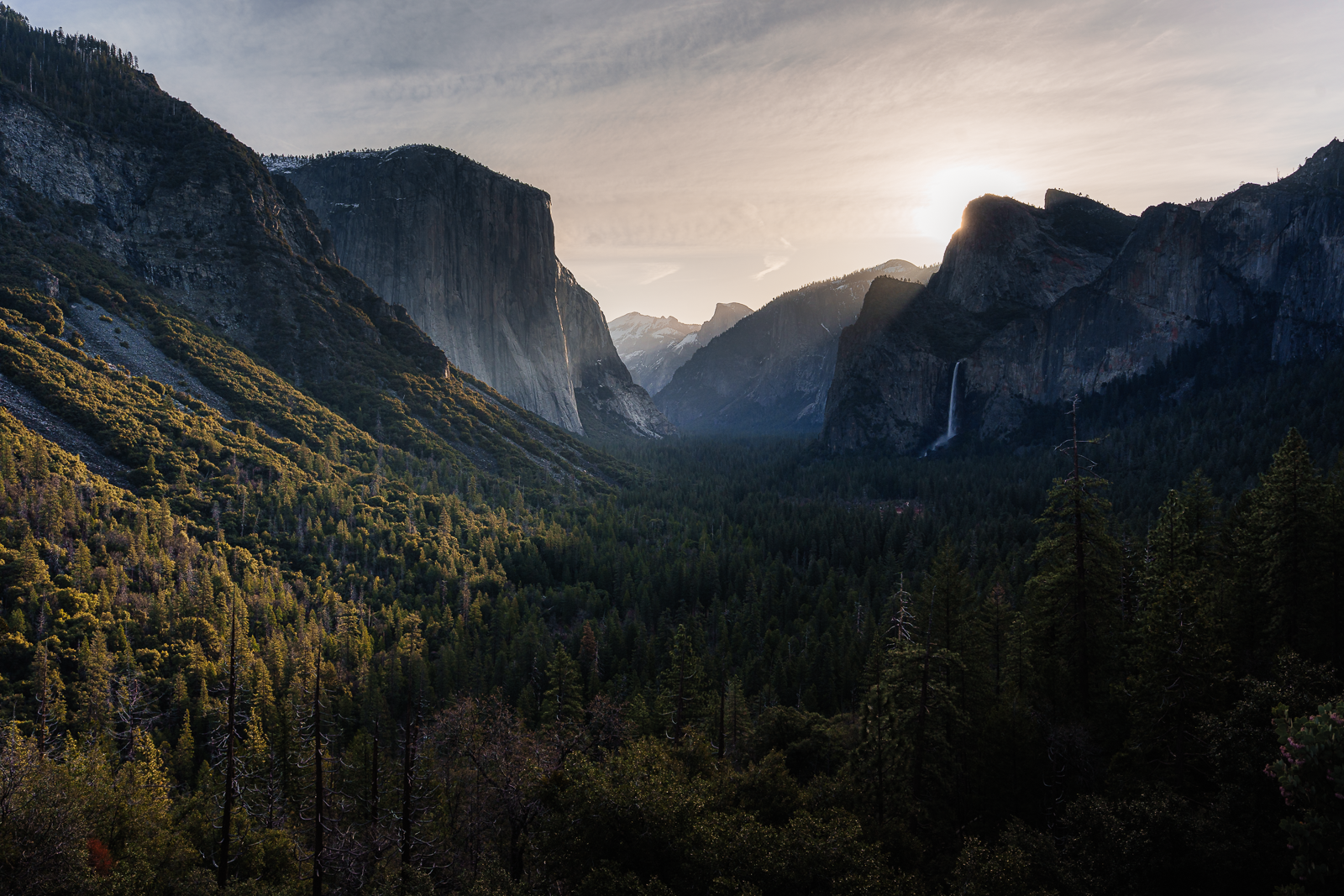 Sunset over the mountains and forest in a national park.