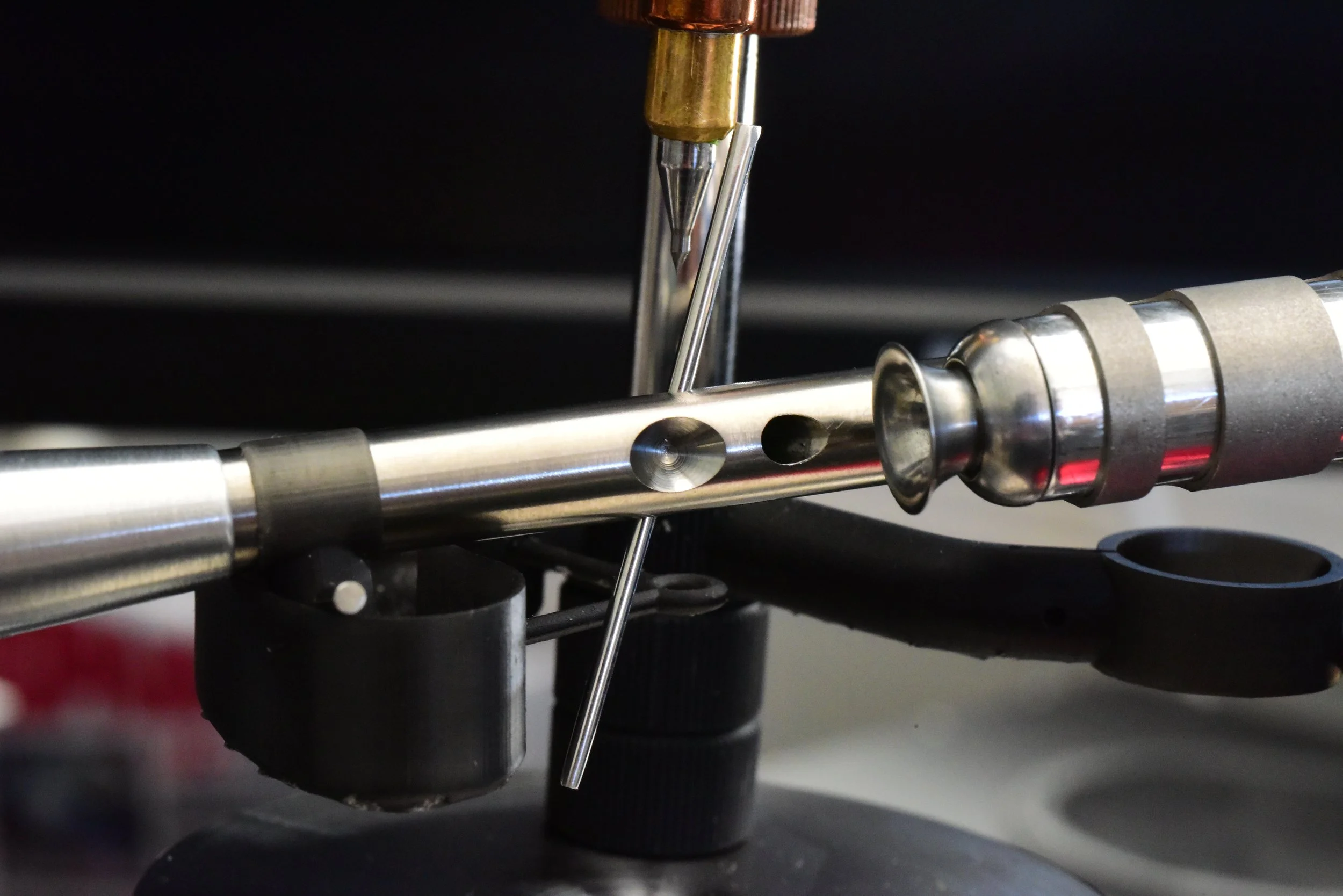 Inverted tungsten unipivot point and titanium connecting rod cup