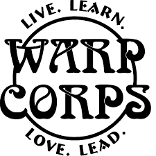 A black and white circular logo with the words 'Live. Learn. Love. Lead.' around the border and 'WARP CORPS' in stylized font in the center.
