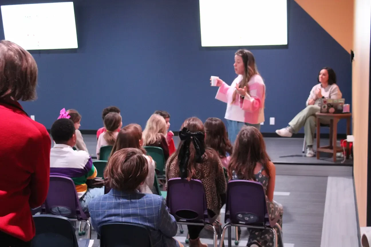 Children and teachers gathered for kid's worship and Sunday School on a Sunday morning