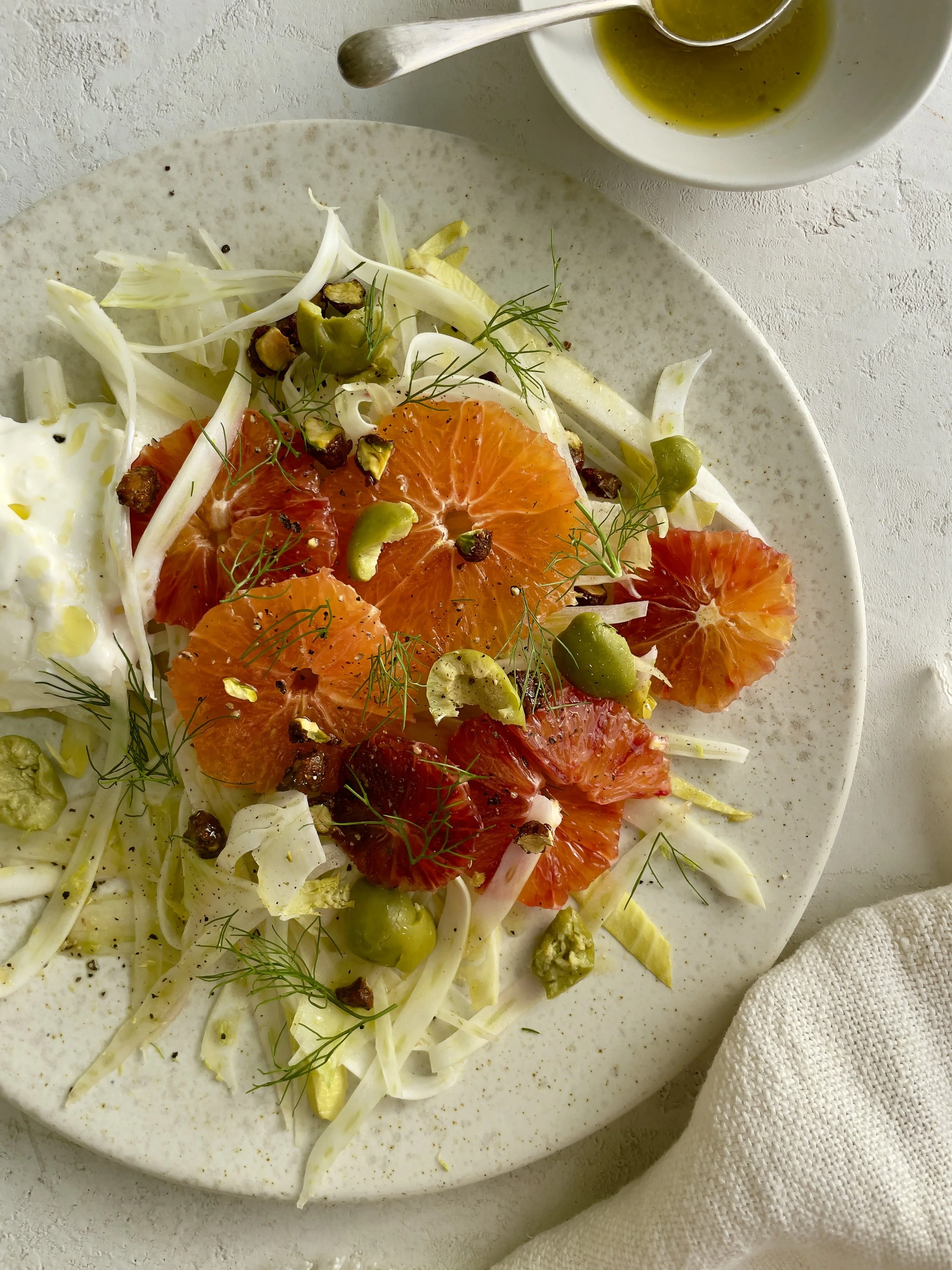 Citrus Salad with Green Olives, Burrata, and Honey-Roasted Pistachios