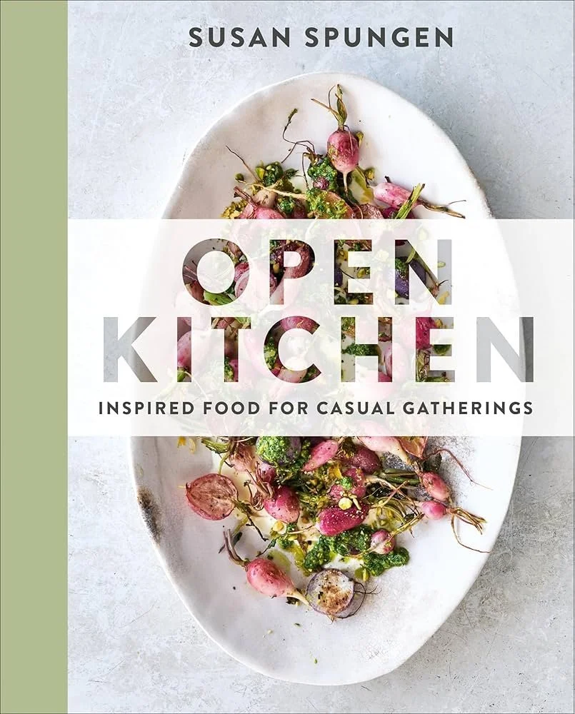 Book cover for 'Open Kitchen' by Susan Spungen, featuring an oval white dish with fresh radishes and greens, over a grey background with a green vertical strip on the left.