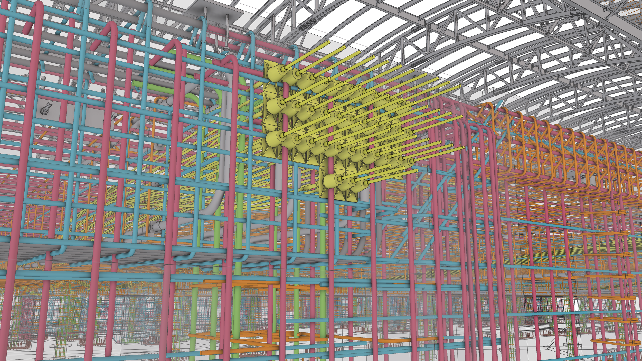 A digital 3D rendering of a complex scaffolding or structural framework made up of numerous interconnected colorful pipes and beams, including yellow, pink, blue, green, orange, and gray, inside a large industrial or construction facility.
