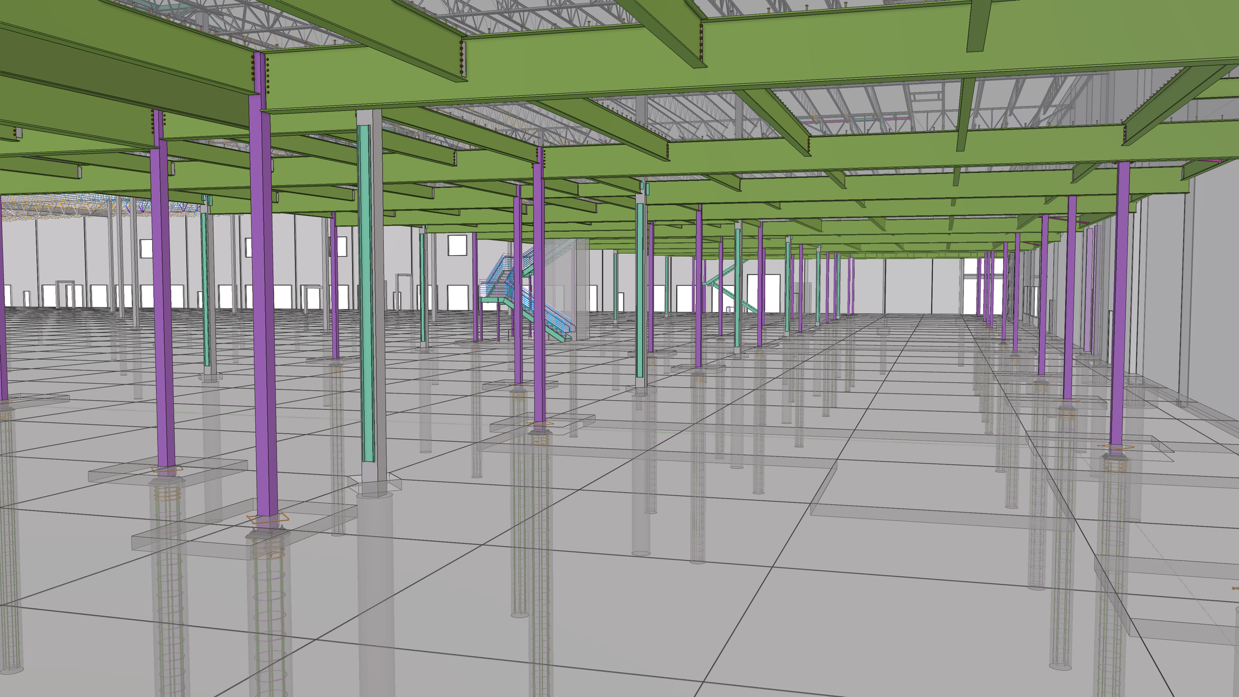 Interior of a large building under construction showing green steel beams, purple and teal support columns, and a tiled floor with construction lines. There are stairs and structural framework visible in the background.