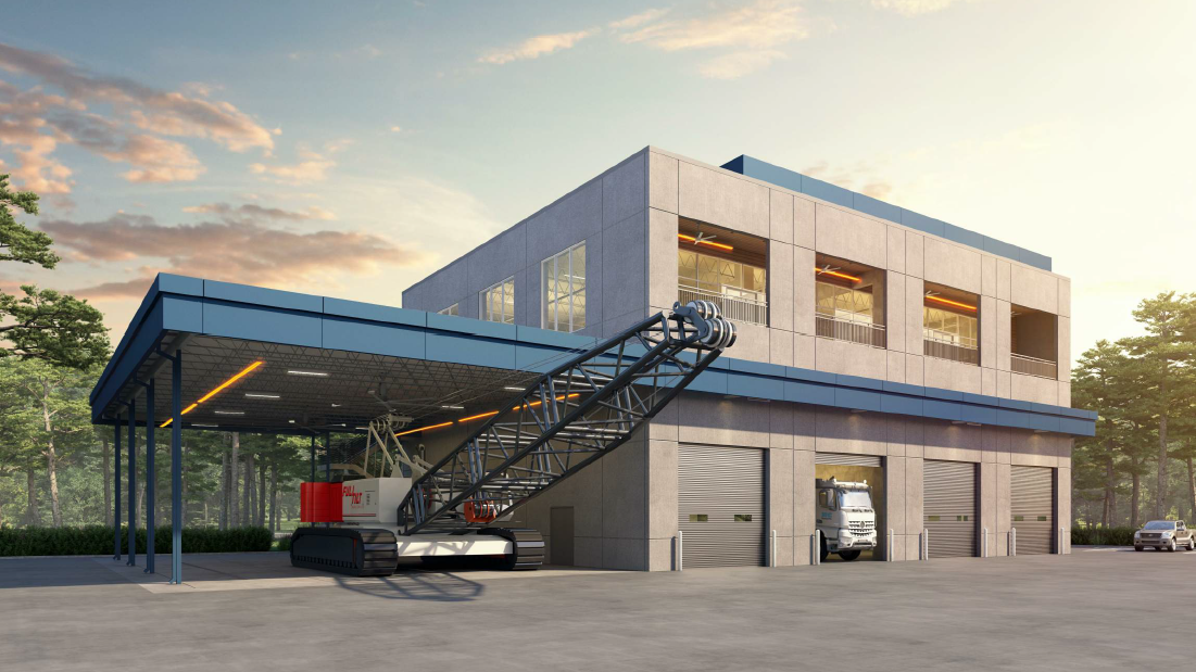 A modern two-story commercial building with large glass windows, a blue overhang, and a construction crane parked in front with a tracked base.