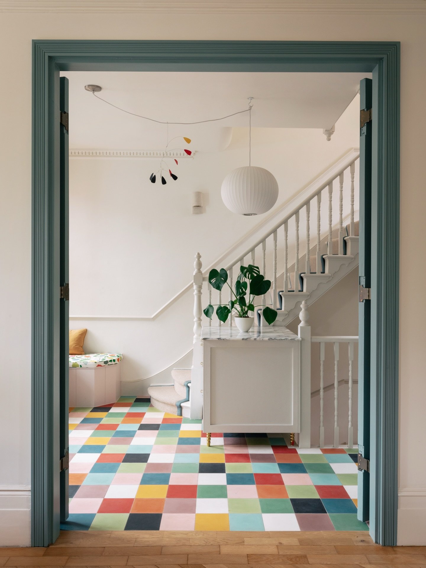 Before &amp; after ✨

We created a large opening to better connect the entrance with the living and kitchen spaces, introducing large painted reclaimed double doors to bring light and flow through the home. 

The original parquet timber flooring was 