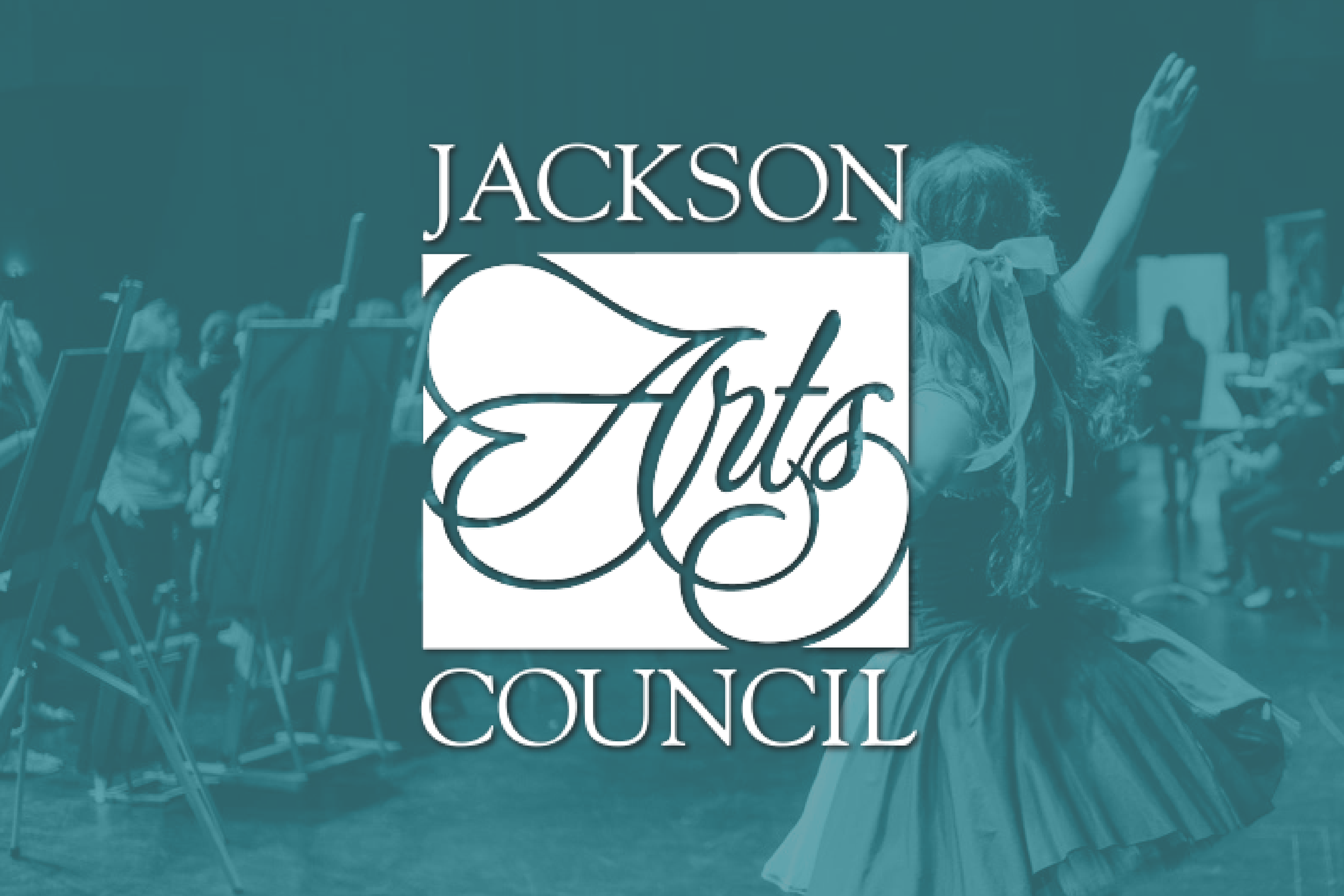 Logo of Jackson Arts Council over a background of children dancing on stage