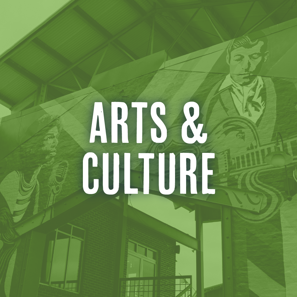 An outdoor mural featuring local music legends, with the words 'Arts & Culture' overlaid in white text on a green transparent background, situated on a brick building with a balcony and metal roof.