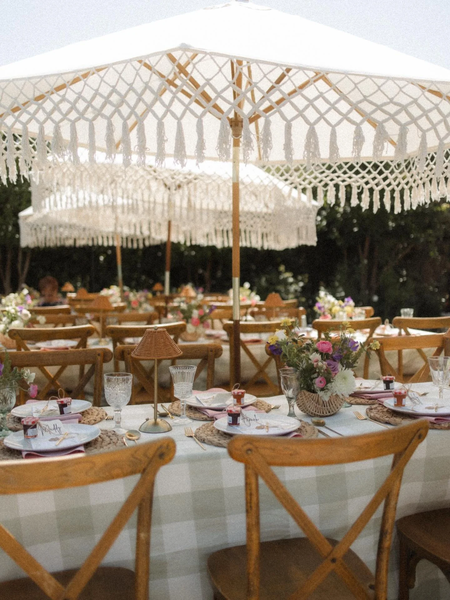 brb we are still dreaming about this Fresh Off The Market bridal shower tablescape 💭🥰💐💍

Event Coordinators @hearthandvine.co 
Florals @_bennettblooms 
Glassware &amp; Place Settings @cteventrental 
Chairs &amp; Umbrellas @cteventrental 
Linens @