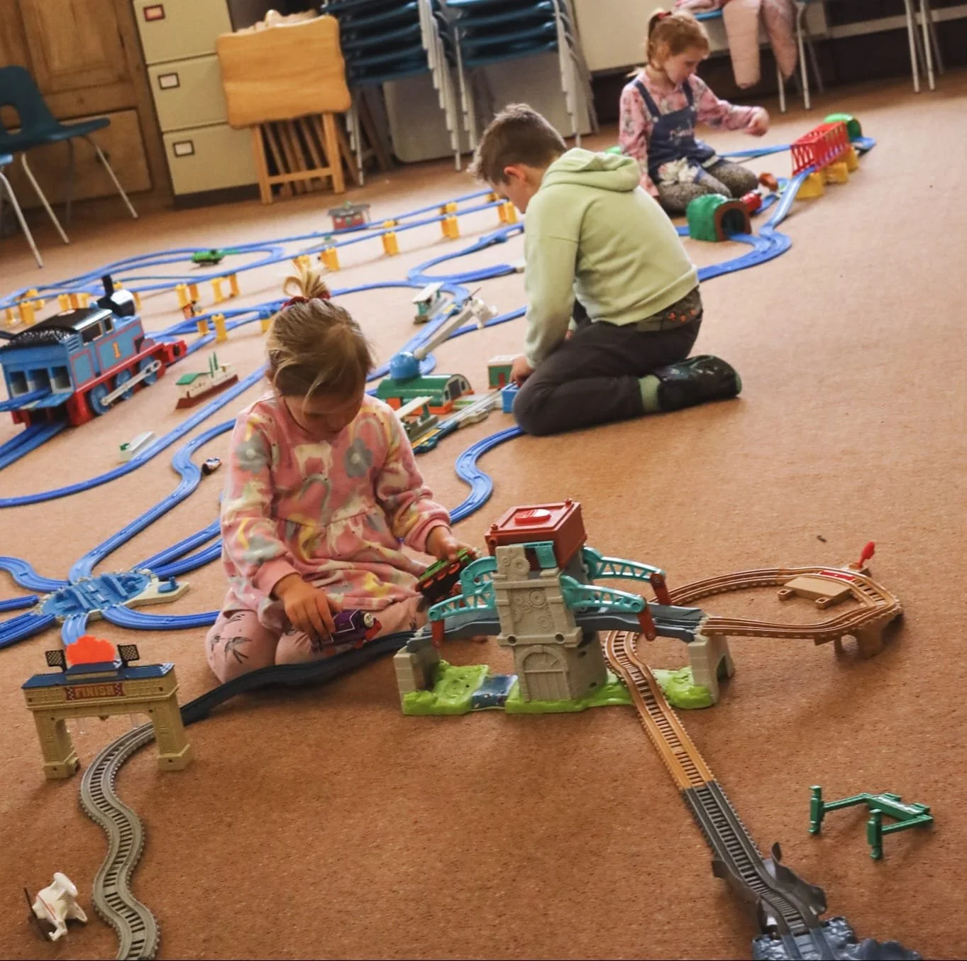 children playing with track
