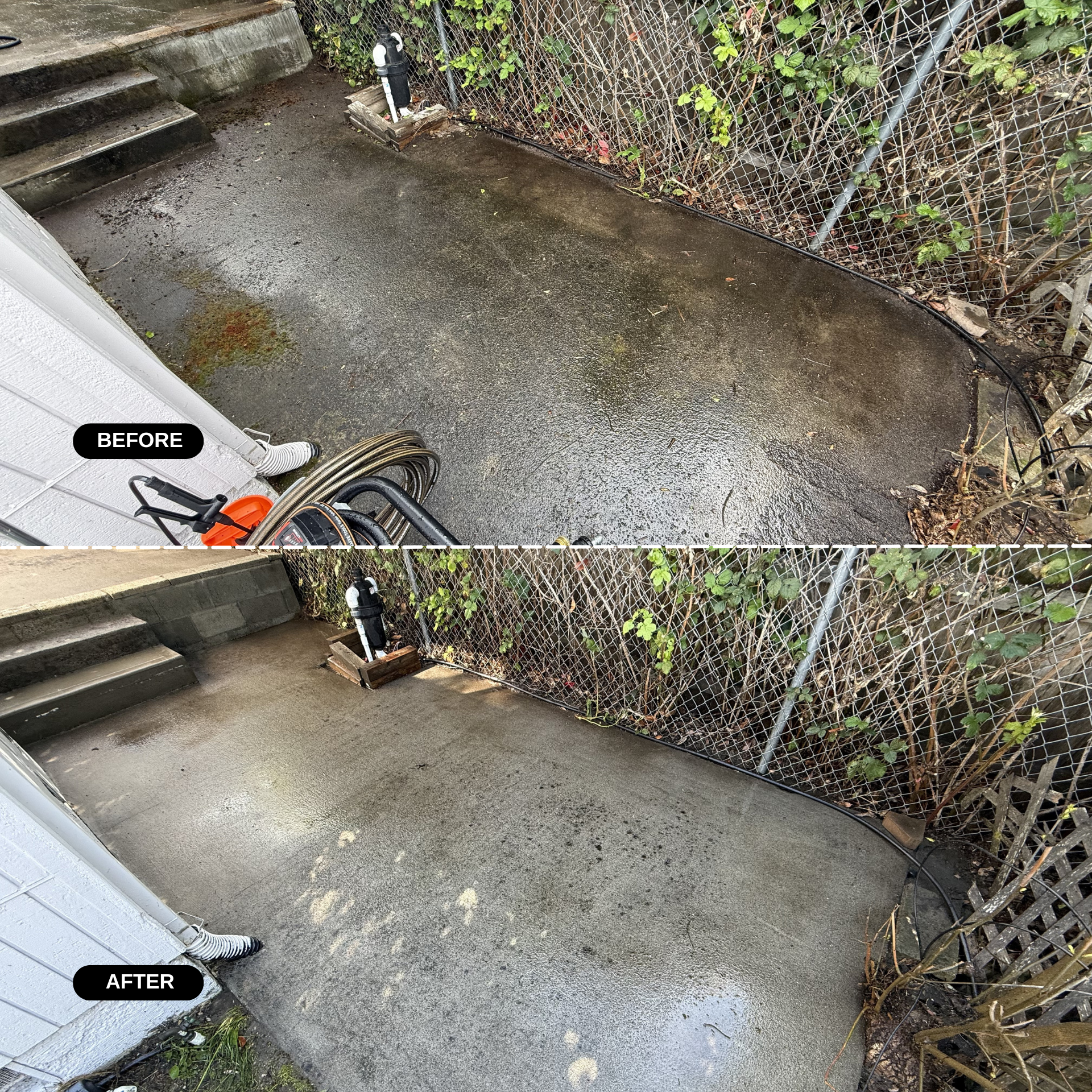 Cleaned and resealed concrete patio area near a house, with stairs on the left, a chain-link fence with plants on the right, and a garden hose and a small garden bed with a water valve in the background.
