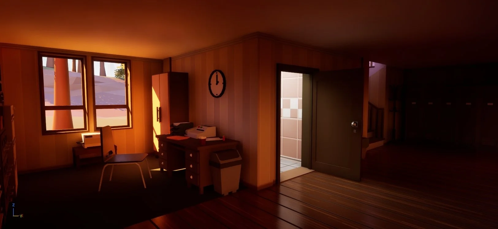 Office room with three windows showing outdoor trees, a desk with office equipment, a chair, a wall clock, a cabinet, a trash bin, and a doorway leading to a tiled bathroom.
