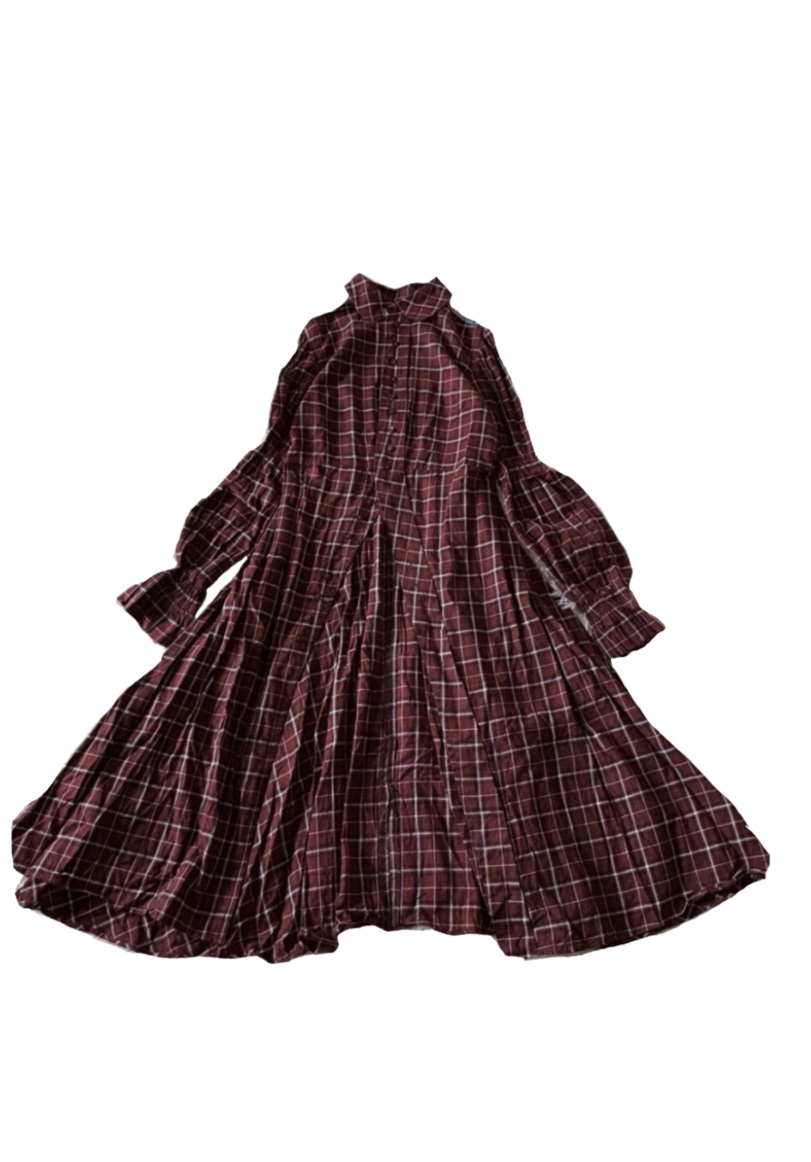 A long-sleeved, knee-length, red plaid dress with a collar, buttons down the front, and pleats in the skirt.