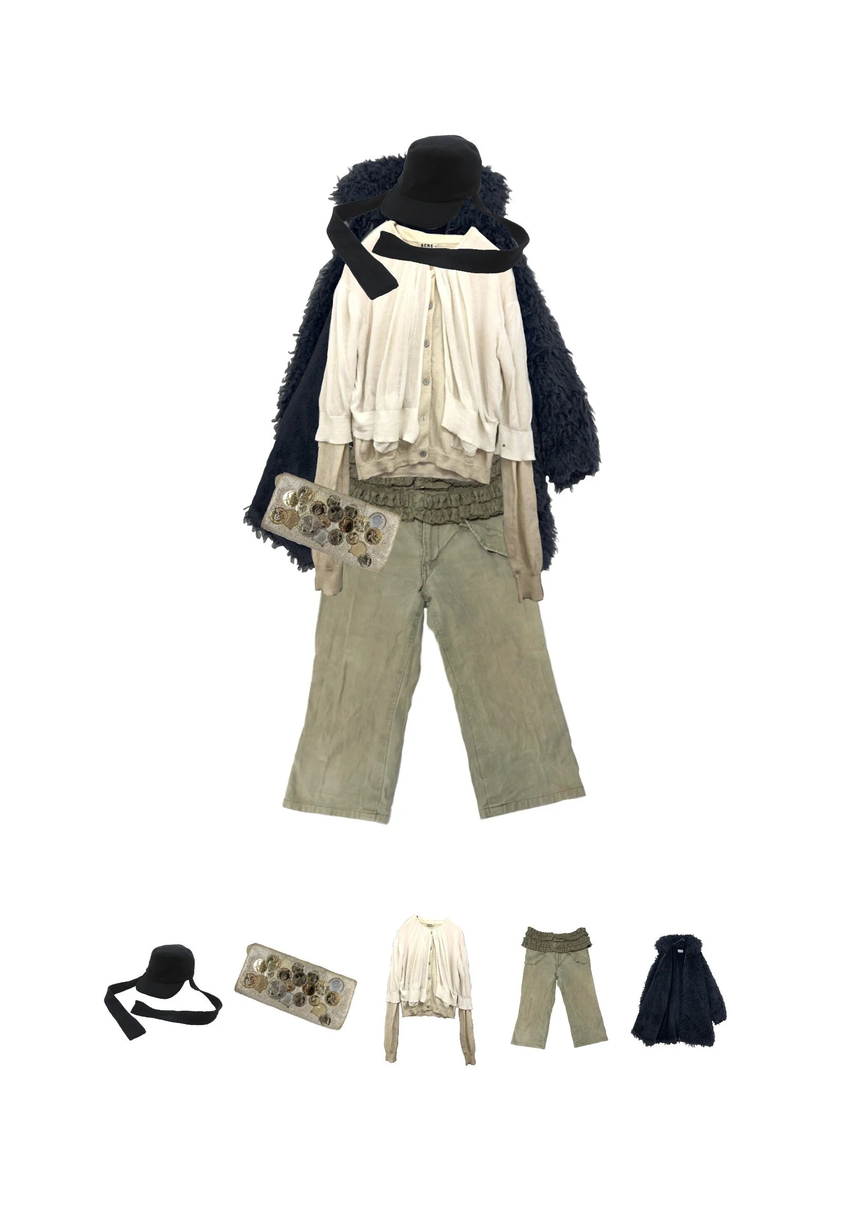 A mannequin dressed in neutral-colored fall fashion, including a black hat with a chin strap, a dark fuzzy coat, a cream blouse, beige pants, and accessories like a jewelry box and a small purse.
