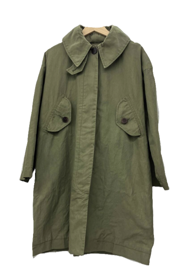 Olive green long trench coat hanging on a wooden hanger