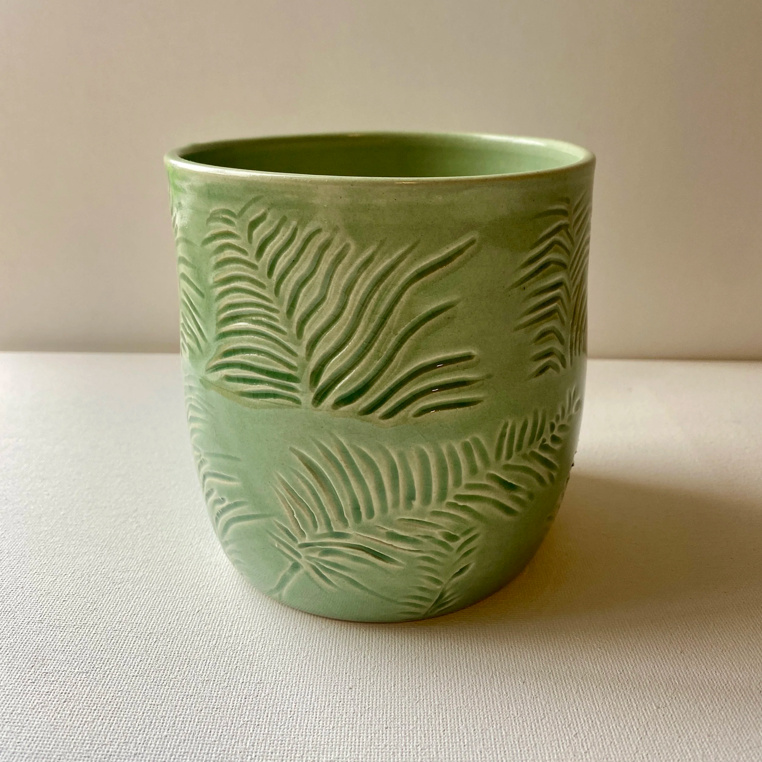 carved green fern vase
