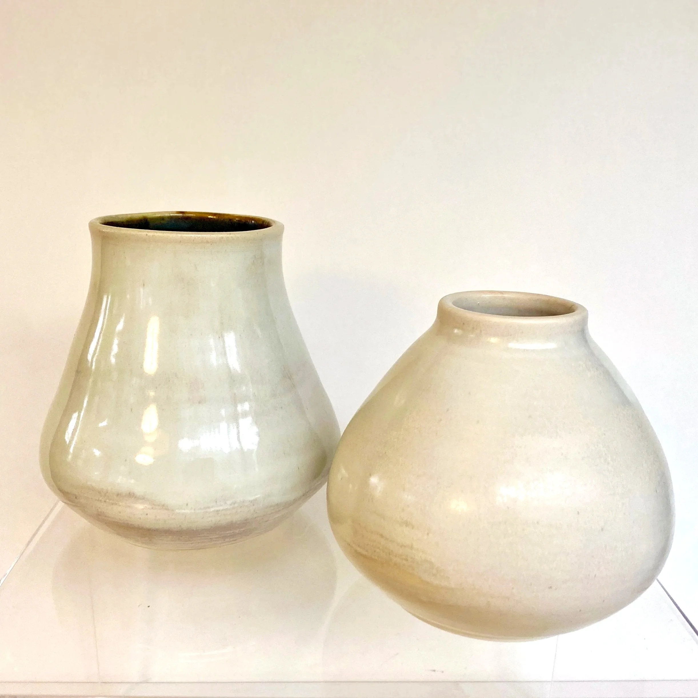 two large coral vases