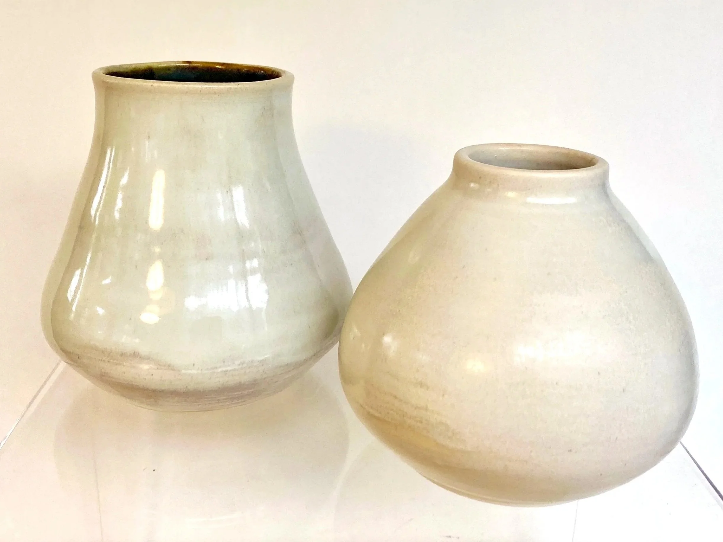 two large coral vases