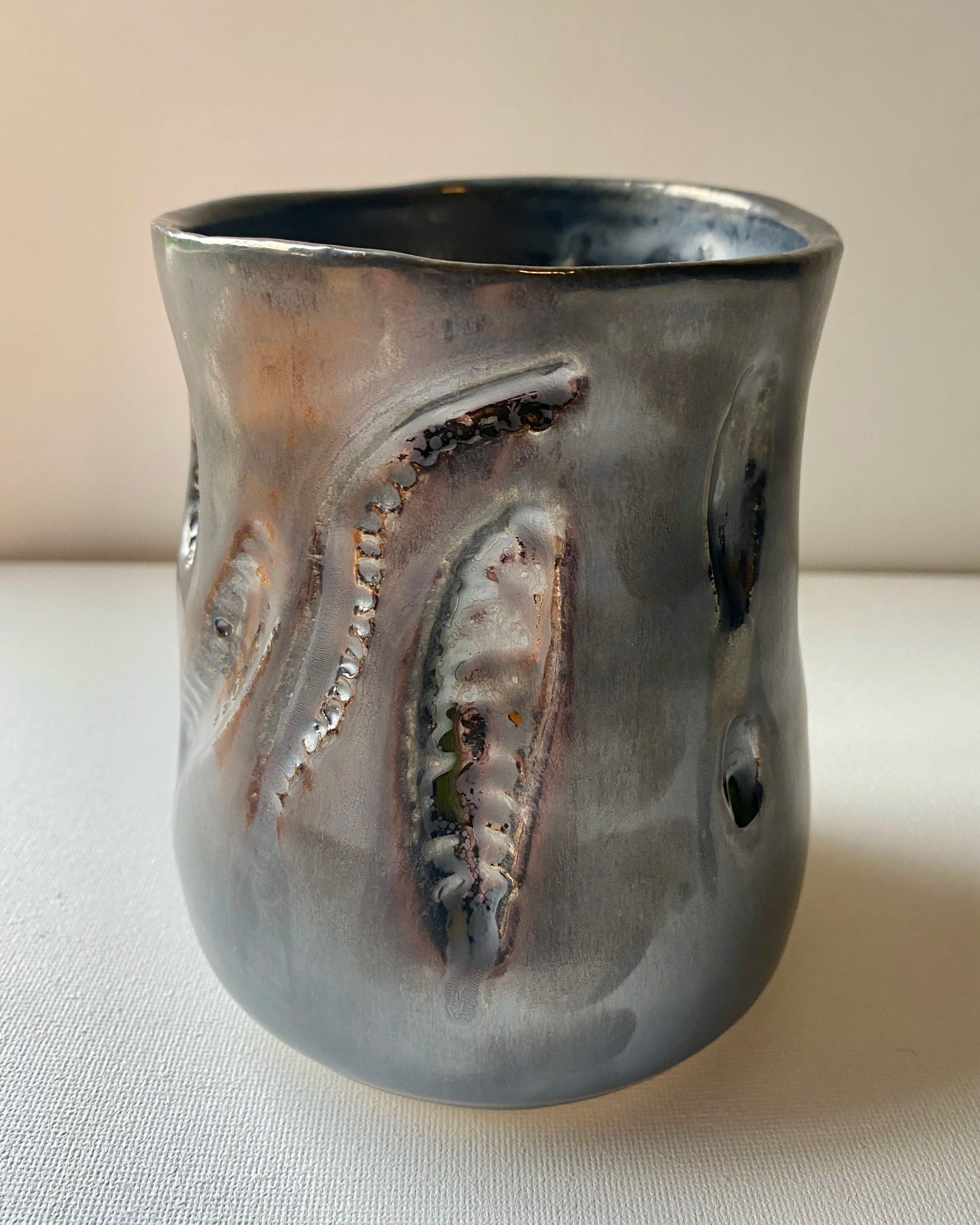 view 1 of metallic carved vase