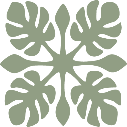 Decorative symmetrical pattern resembling a stylized floral design in green.