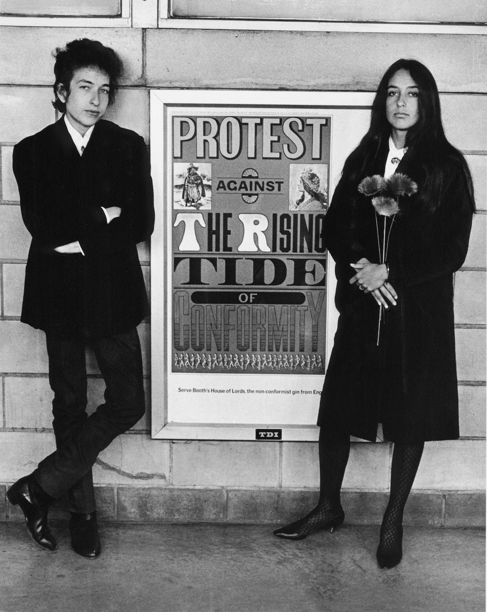 Bob Dylan & Joan Baez with Protest Sign, Newark Airport, New Jersey, 1964
