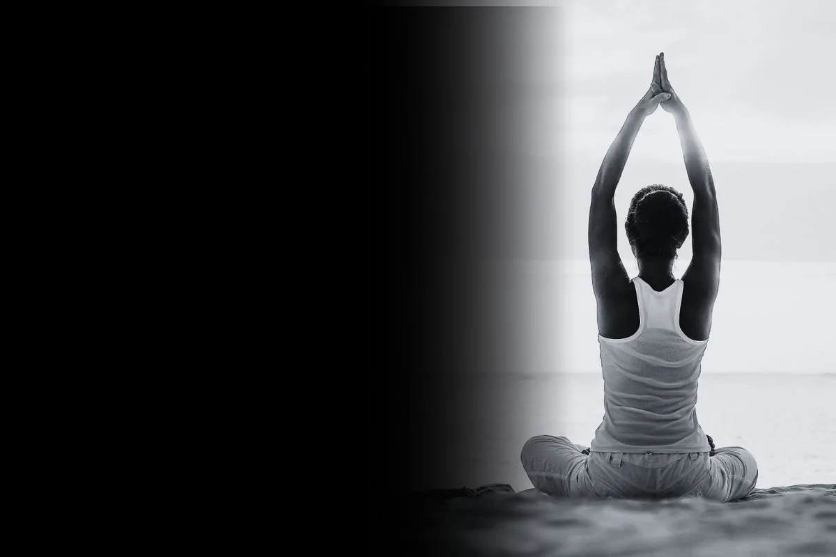 Woman in yoga pose representing functional wellness and whole-body health