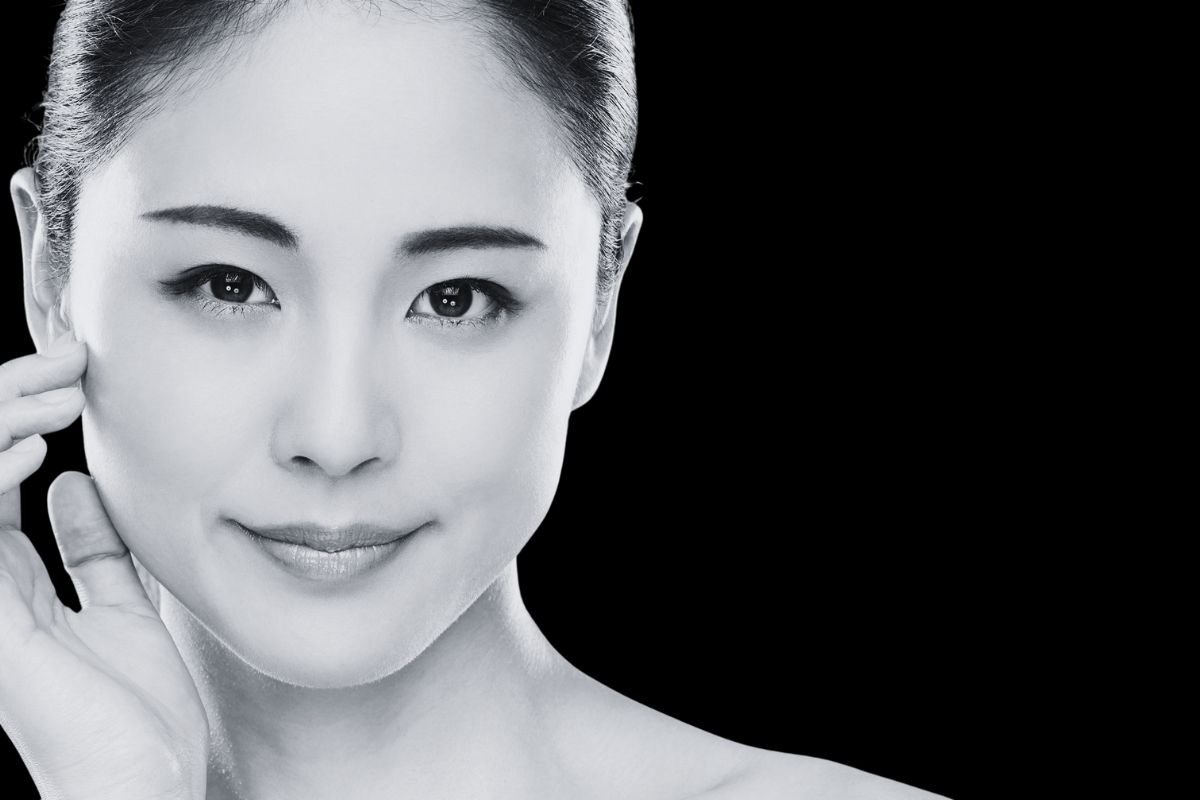 Close-up of woman’s face highlighting clear, youthful skin for aesthetic treatments