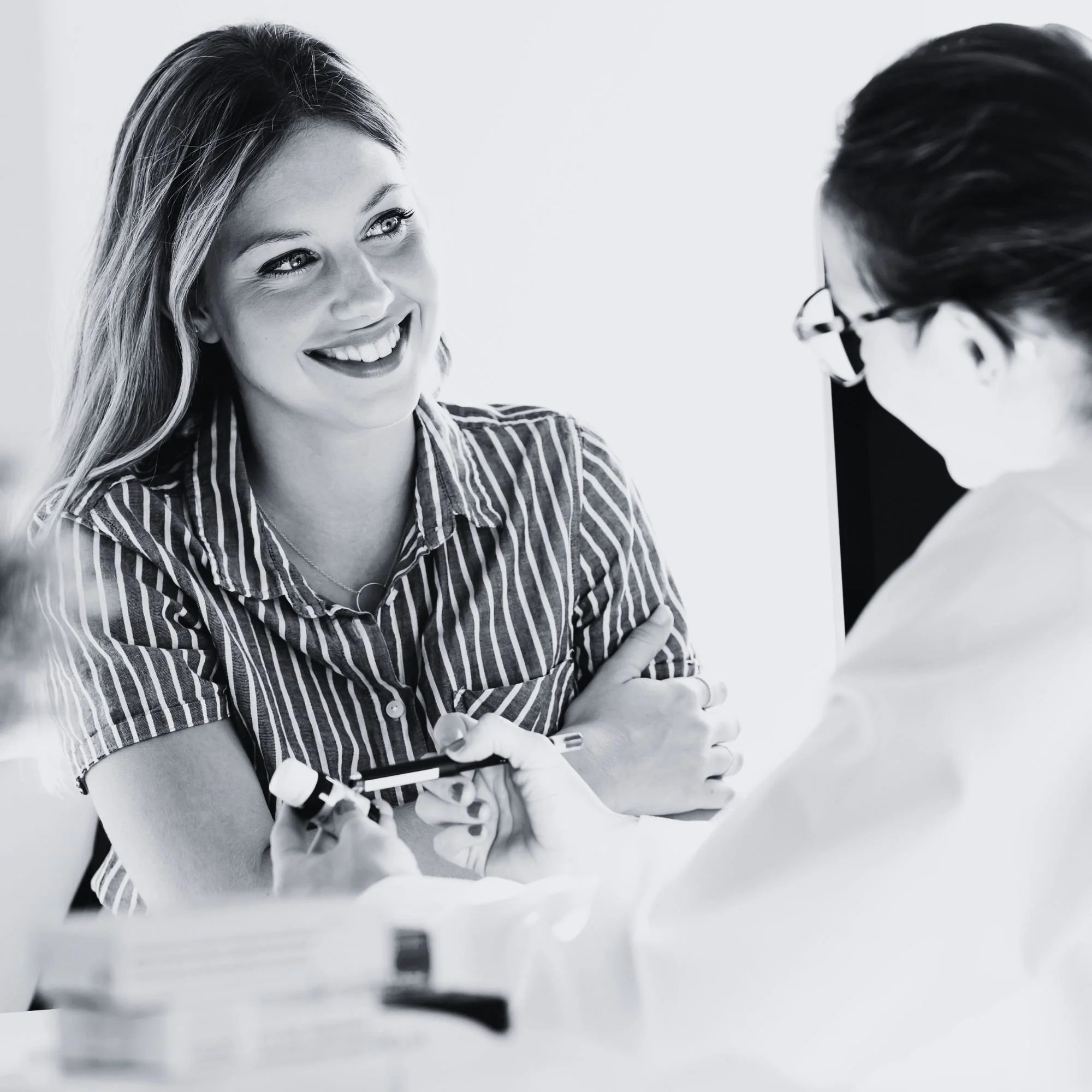 Provider consulting with patient about personalized wellness program