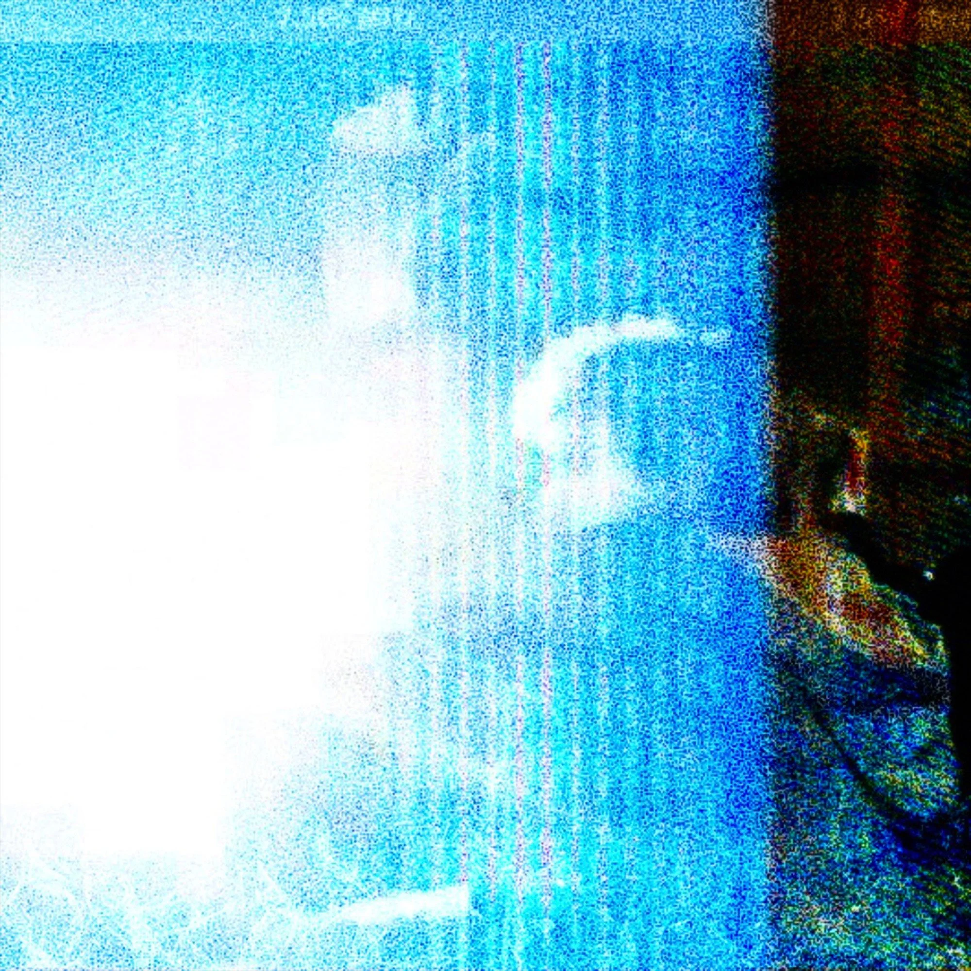 A music artwork featuring a close-up of a screen with a blue and black digital noise pattern, with some faint text or lines visible in the background.