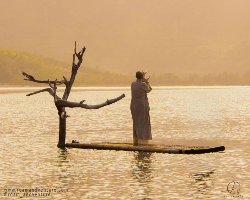 roamandventure monk vietnam sunset  paradise