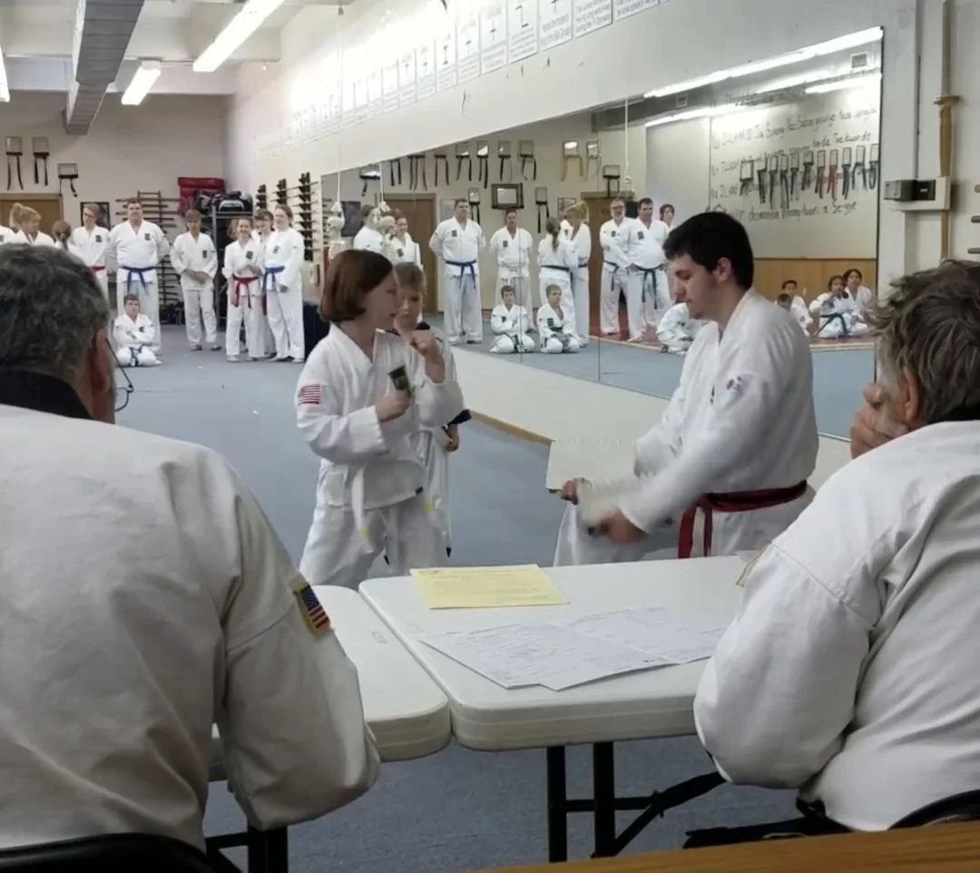 Student preparing to break a board