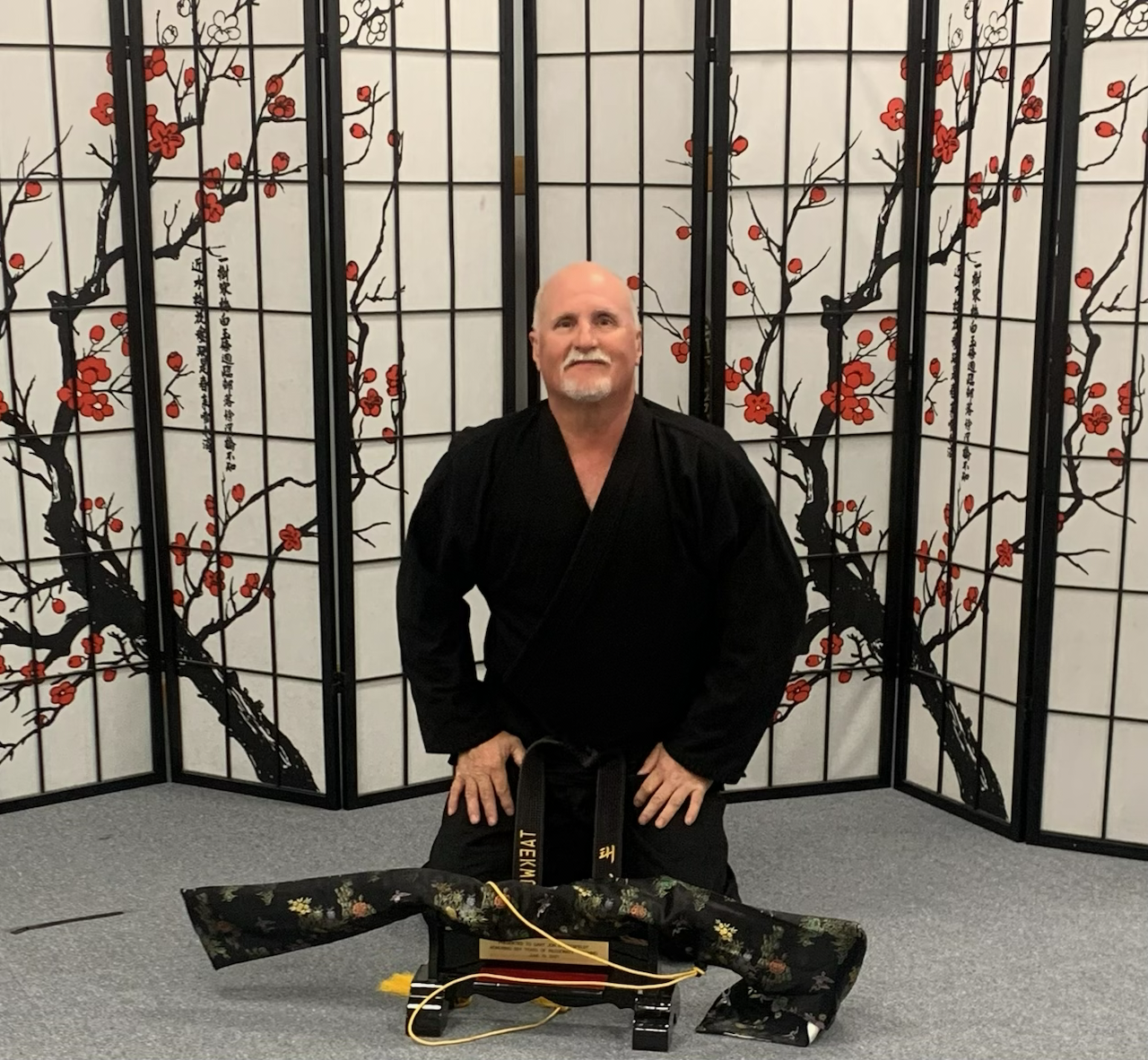 Sahboonim was gifted a sword by his students in commemoration of the dojang's 30th year.