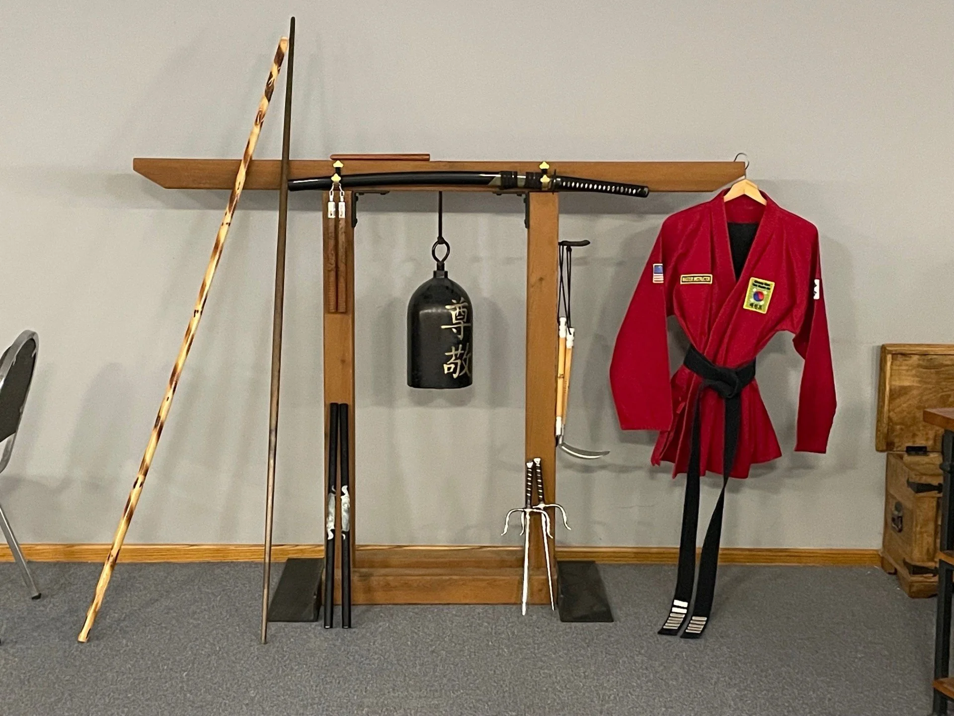 The Dojang shrine with a warrior's dobok.