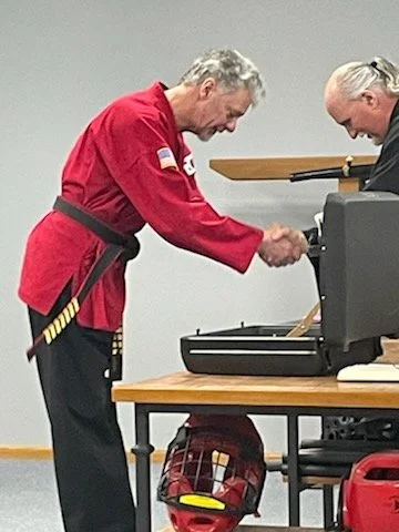 Receiving the 7th Dan from Sahboonim